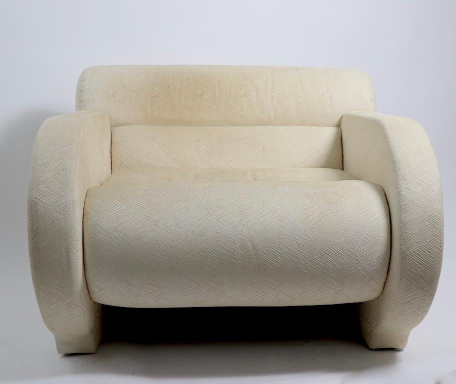 Pure 1980s Art Deco Revival, Hollywood Regency style oversized lounge chair, designed by Milo Baughhman for Directional, signed ( Directional ) and dated ( 1988 ). As comfortable as it is chic and stylish the chair is structurally sound and sturdy,