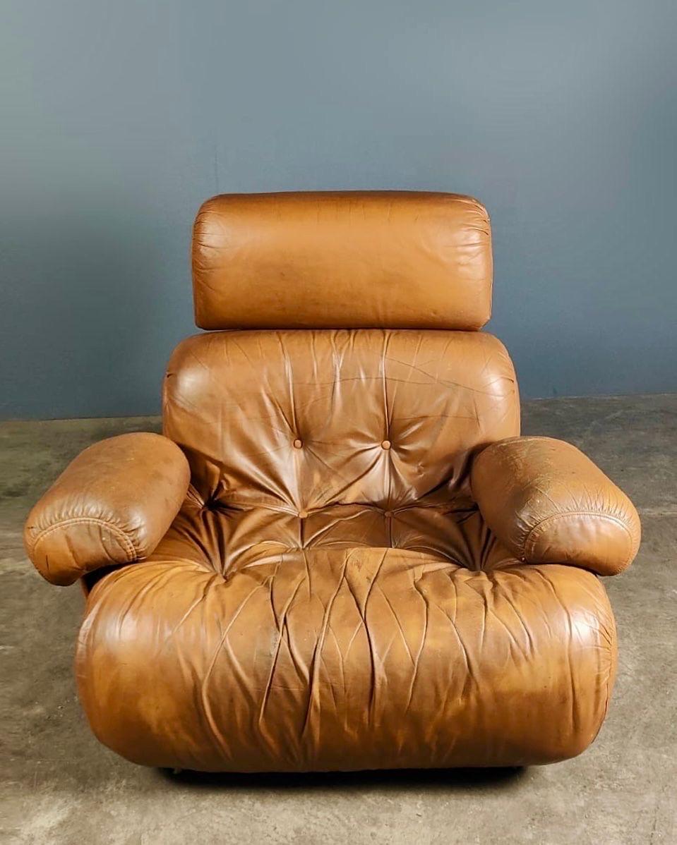 New Stock ✅

Mid Century Oversized Lounge Chair Tan Cognac Leather Cuddle Bubble Shaped Armchair Vintage Retro MCM

In the style of Soriana Lounge Chairs by Afra & Tobia Scarpa for Cassina.

No rips or tears, but not perfect.

Head rest and arms can