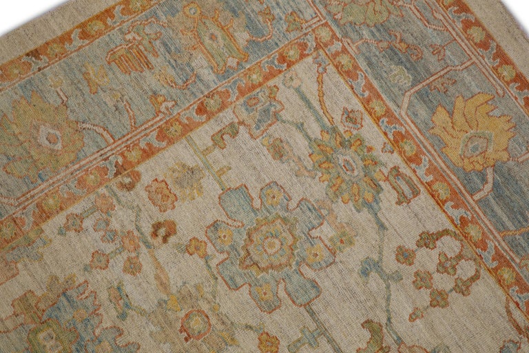 Oversized Modern Turkish Oushak Rug with Brightly Colored Floral Details For Sale at 1stDibs