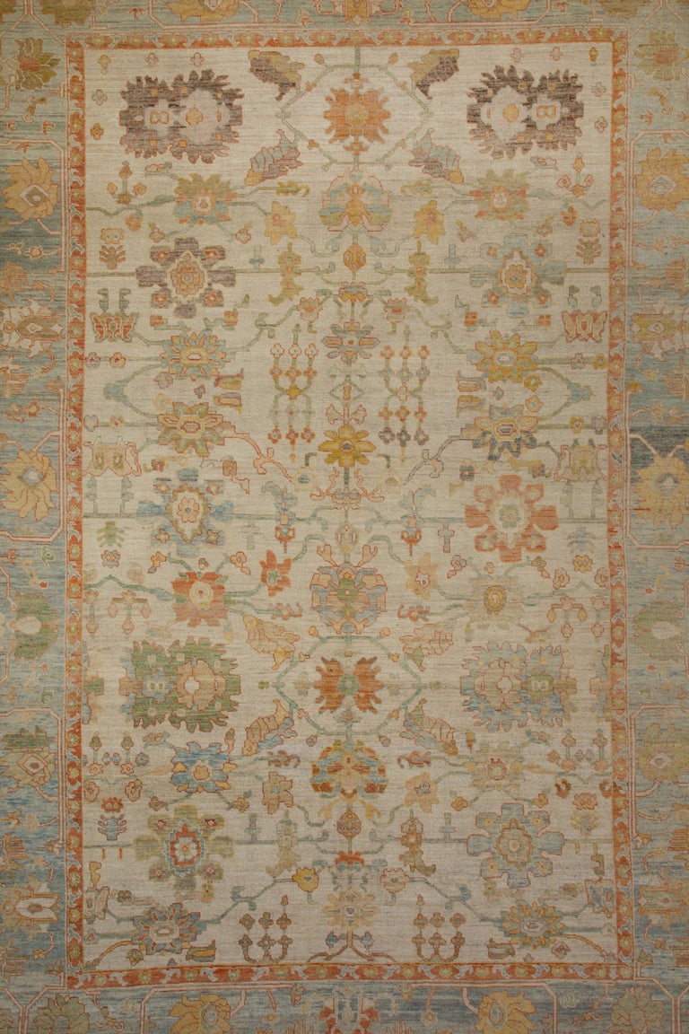 Oversized Modern Turkish Oushak Rug with Brightly Colored Floral Details For Sale at 1stDibs
