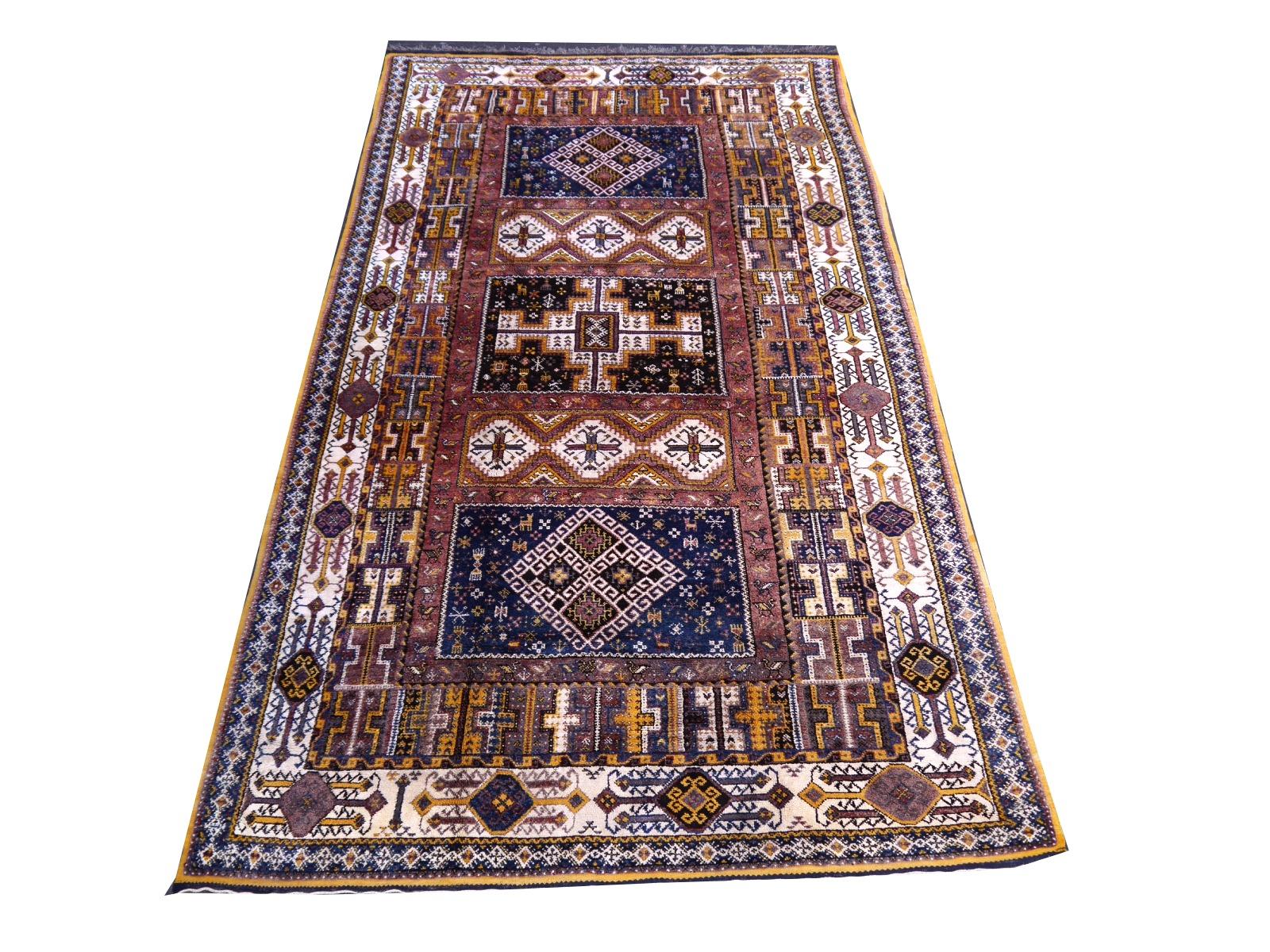 Berber rugs and carpets are mainly made in Morocco, Tunesia and Algeria. Largest producer are the tribal and nomadic Berber people of Morocco. Different areas produce very beautiful works of art. 

This rug was made in a village in the Atlas