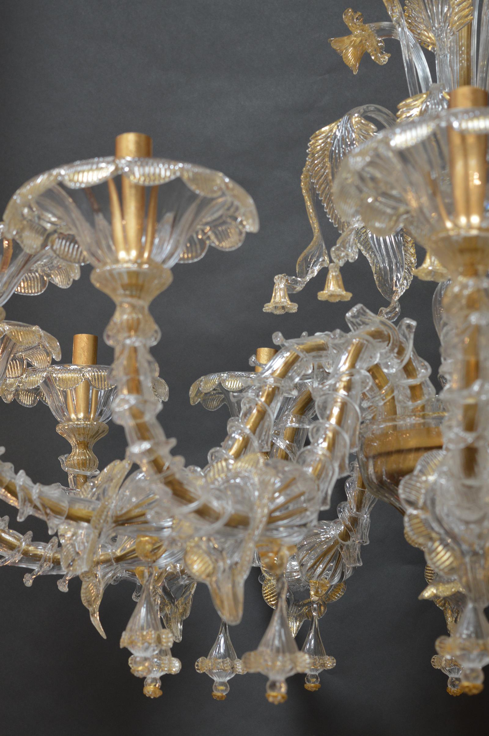 Murano chandelier with gold flecks.