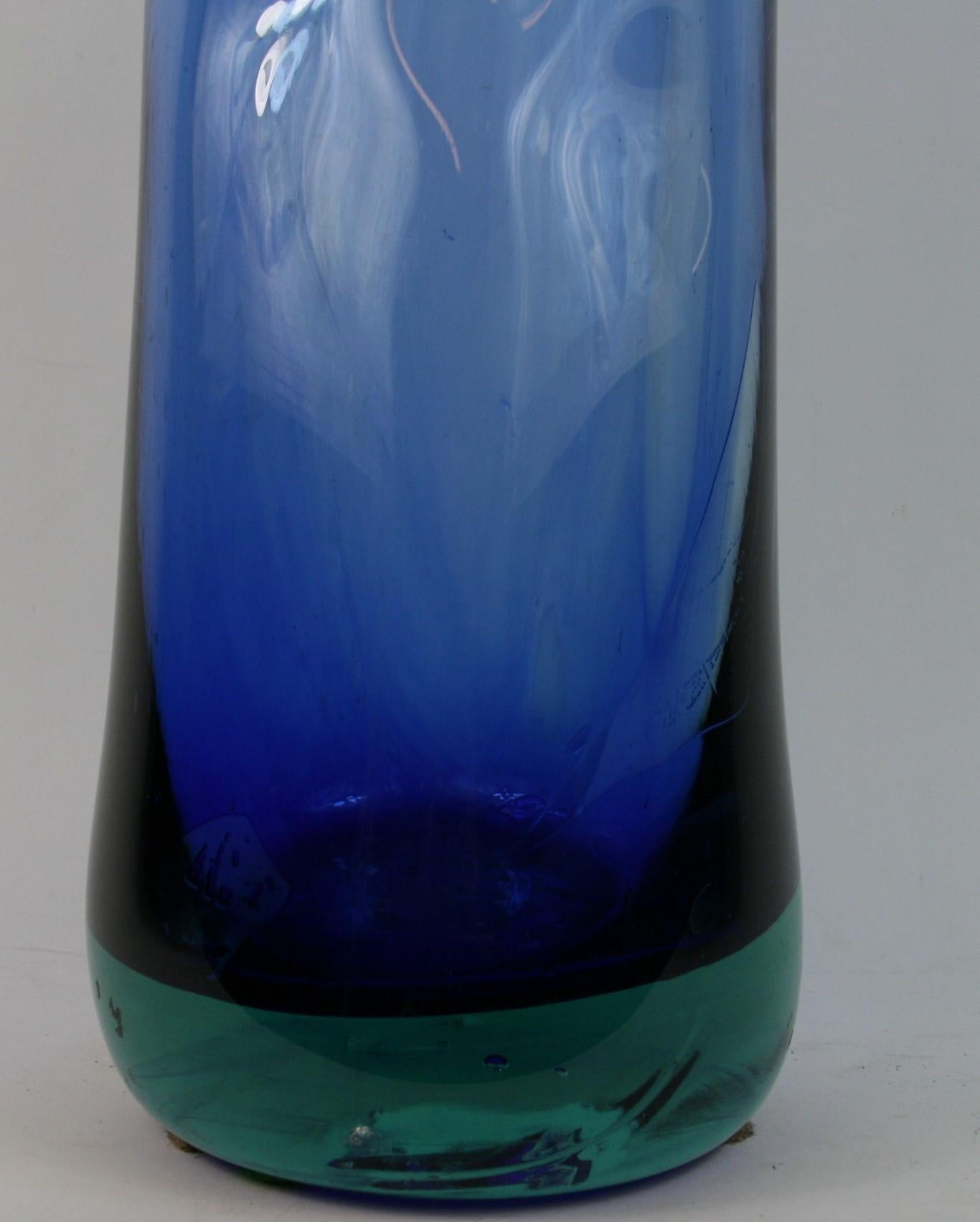 3-172 oversized Murano blue and aqua sommerso mouth blown glass vase.
Irregular shaped top and non linear vernical line with 3 indentations on center.

  