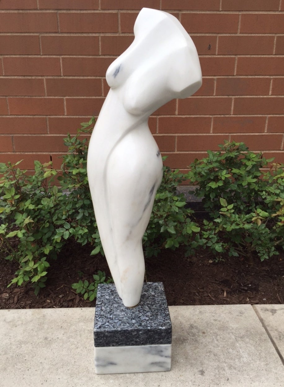 Nude, female, oversized marble sculpture on a marble and granite base.
The base alone measures: 8.13