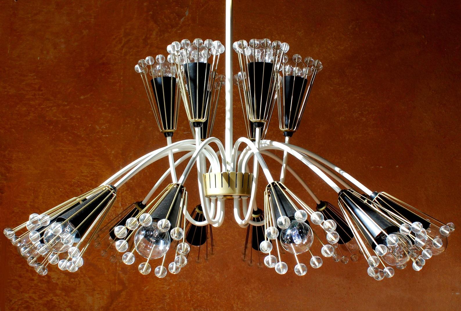 Oversized romantic 18 Lights (E27) Starburst Sputnik Chandelier. Steel Body, enameled in black, warm white & gold nuances with 216 (+4) Glass Pearls. 

Object description: gigantic chandelier in white, black & gold enamel, 18 lights (e27) with 216