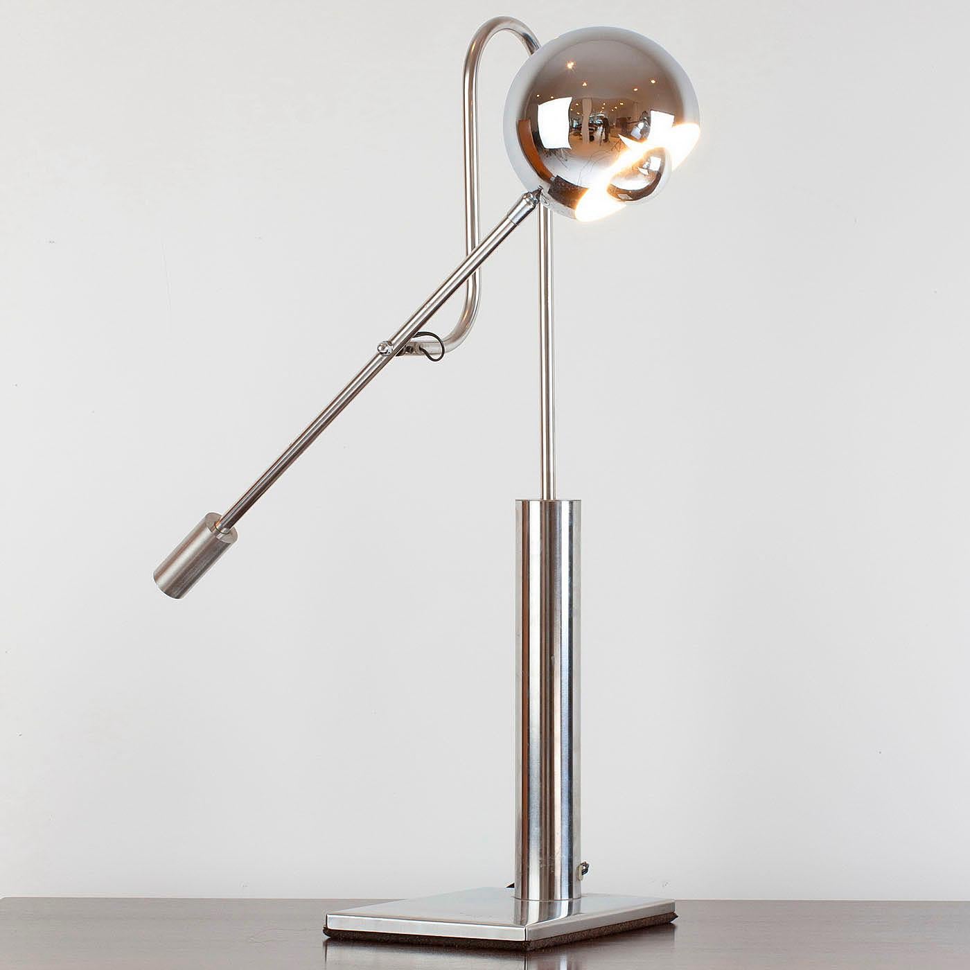 Fine quality, elegant table lamp by J Bouvier, Paris. Signed. The shade can be oriented in different directions and arm moved up and down. Due to its scale it fits well on a large imposing desk and is practicle yet elegant.