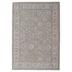Oversized Oushak Inspired Rug with Subtle Accents in Sage, Coral, and Ivory