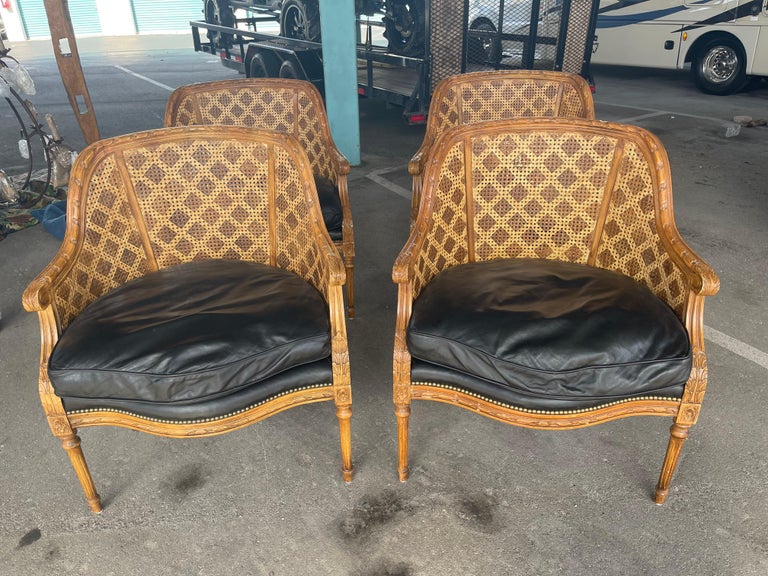These chairs are stunning and comfortable. I love the attention to detail with the cane being double sided. The leather cushions are a nice feature as well. They do show signs of wear but in a good way since they are vintage. The stenciling on the