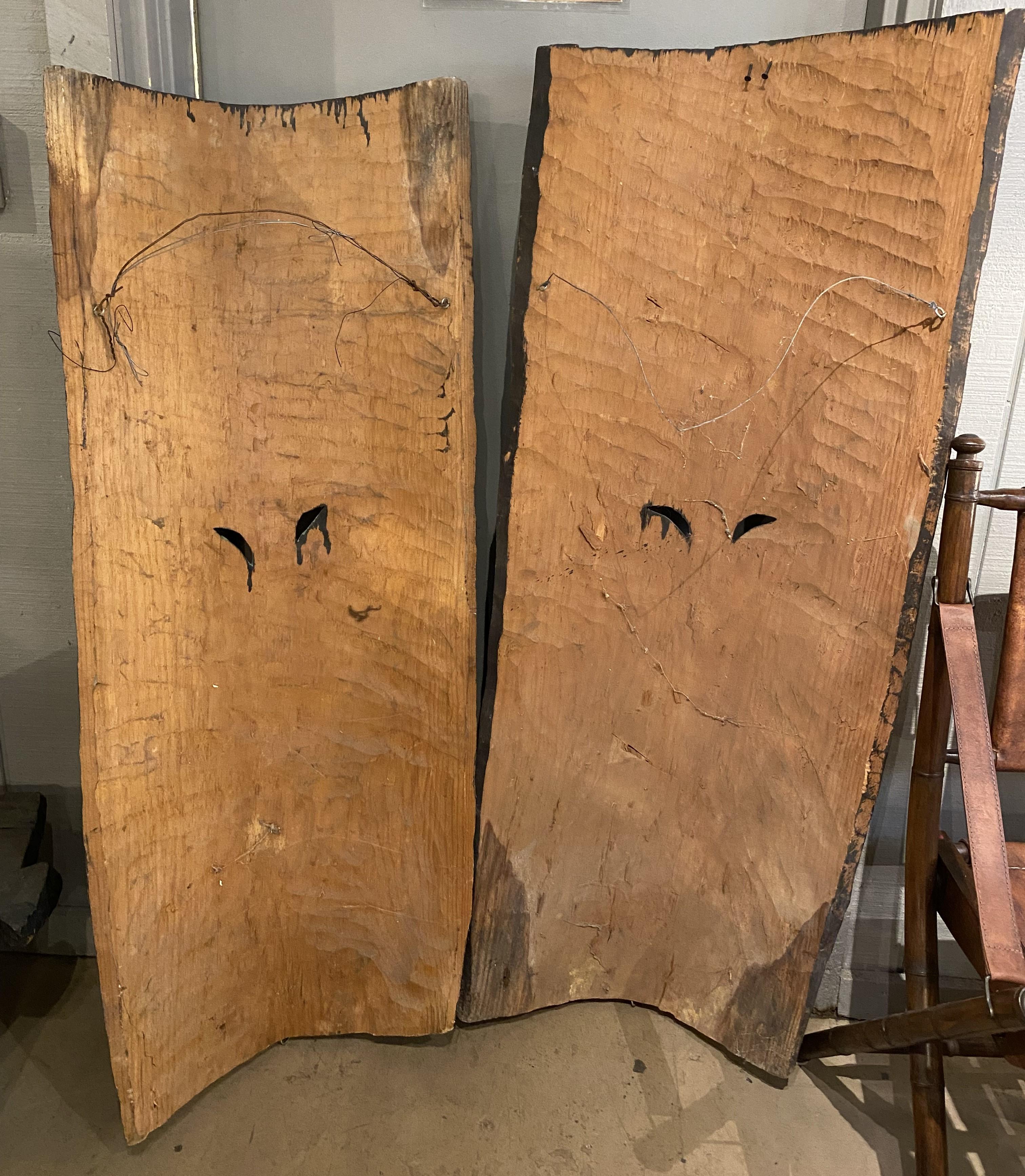 Oversized Pair of Vintage  Polychrome Carved Wooden Tiki Mask Wall Hangings For Sale 1