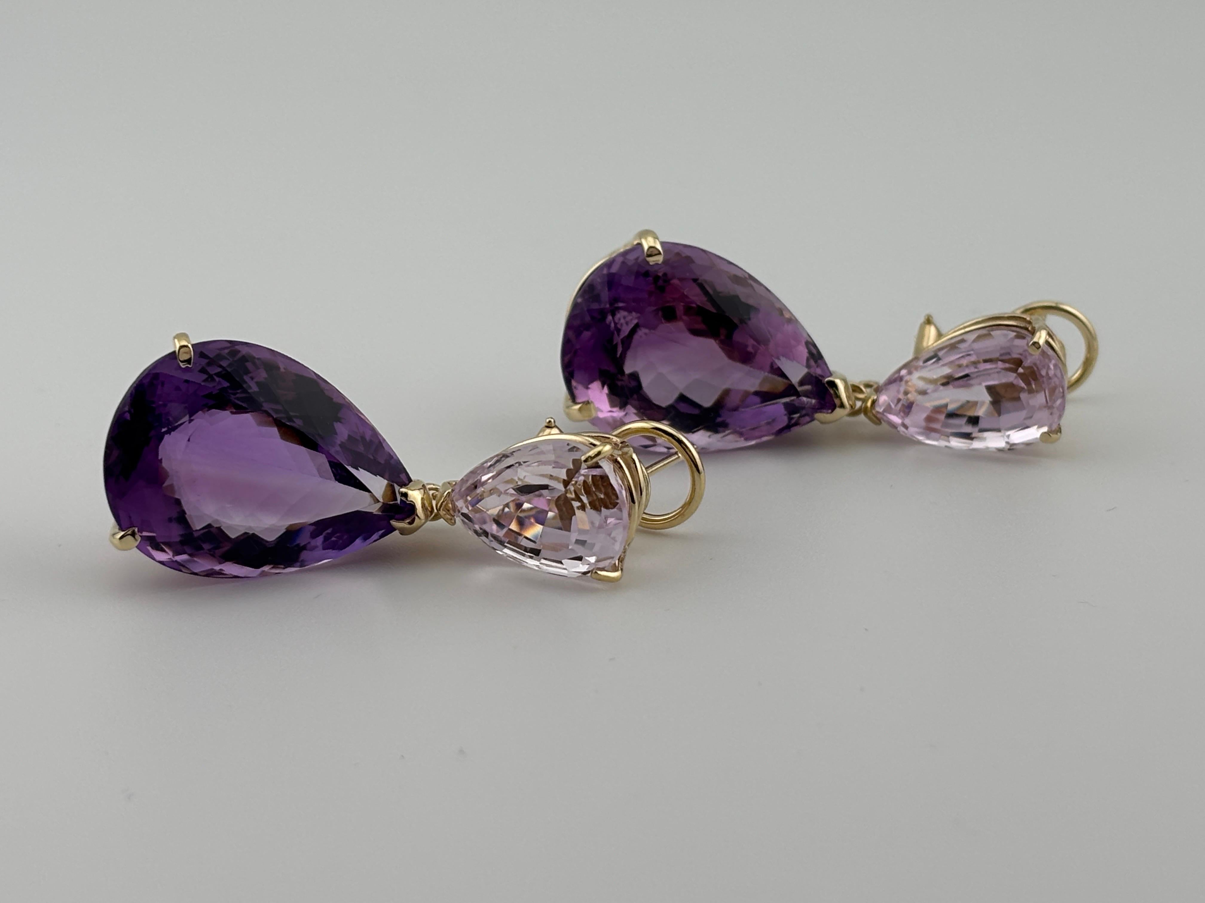 These earrings are bold, dramatic, and glamorous, with the oversized pear-shaped gemstones acting as the central focus. The combination of amethyst and kunzite—both vibrant, eye-catching stones—paired with the warmth of 14k yellow gold, creates a
