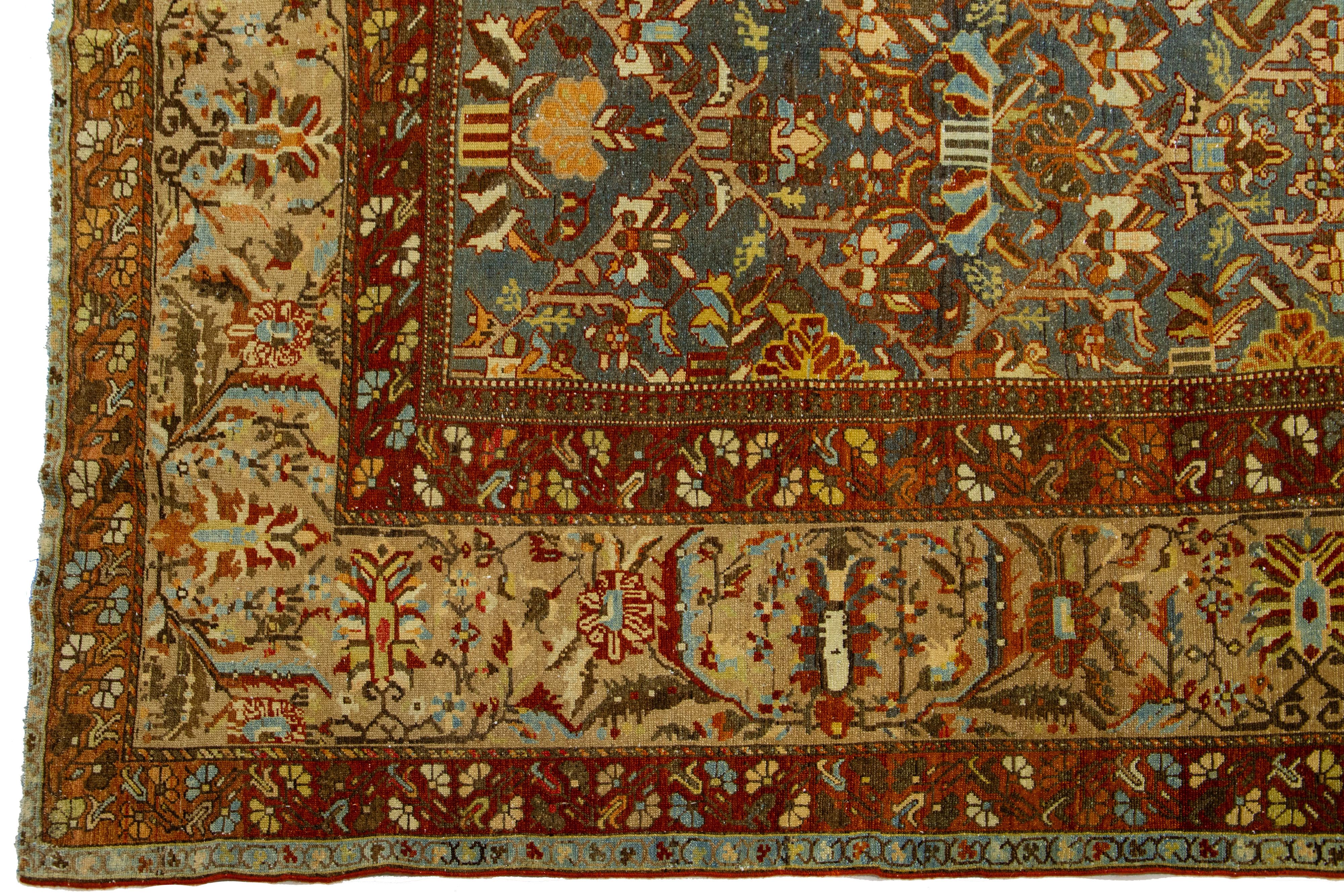 Hand-Knotted Oversized Persian Bakhtiari Blue Wool Rug, handcrafted in the 1900s For Sale
