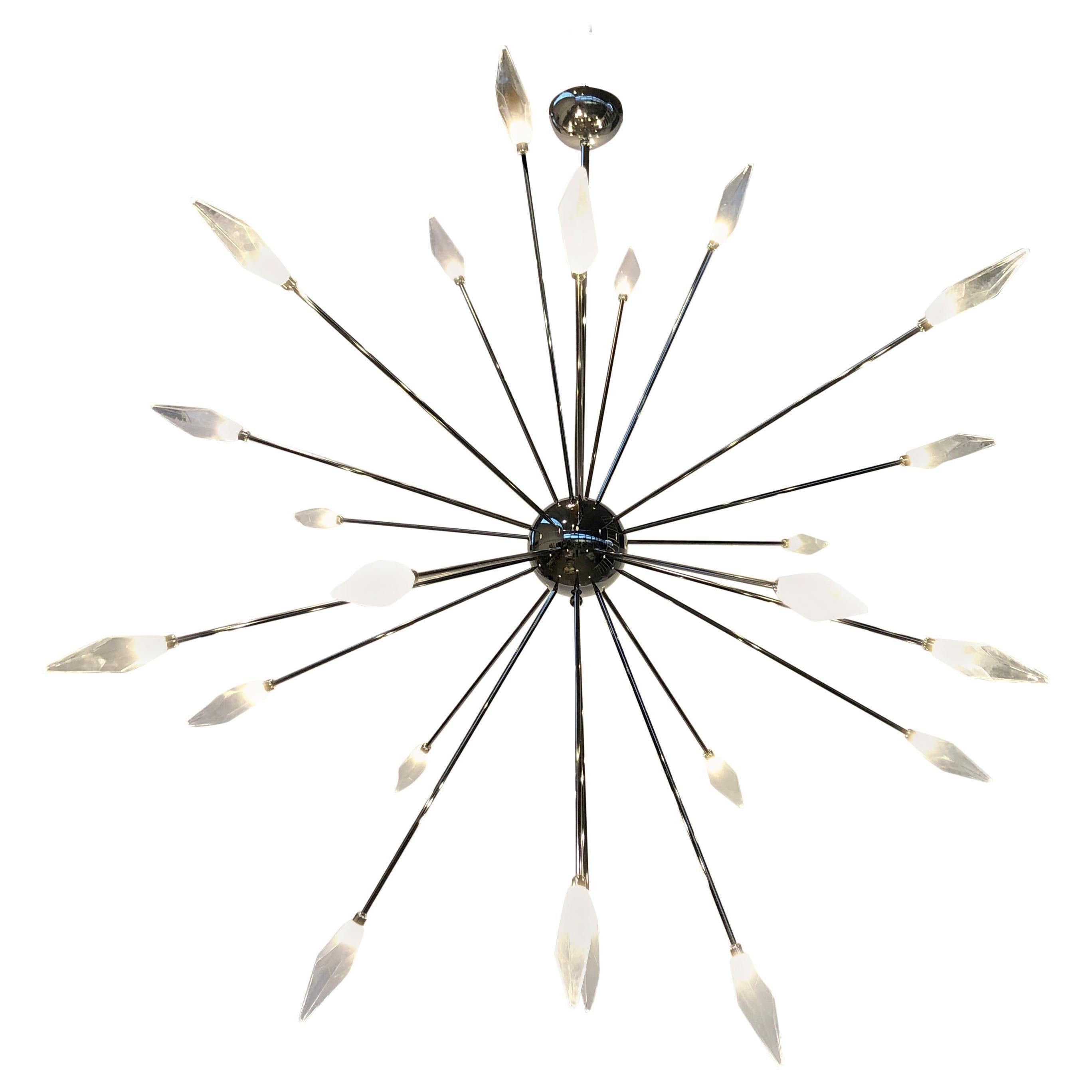 Oversized Italian Sputnik chandelier with 24 clear poliedri, or polyhedron/polyhedral shaped Murano glasses mounted on polished nickel finish frame / Designed by Fabio Bergomi for Fabio Ltd / Made in Italy
Measures: Diameter 118 inches, height 126