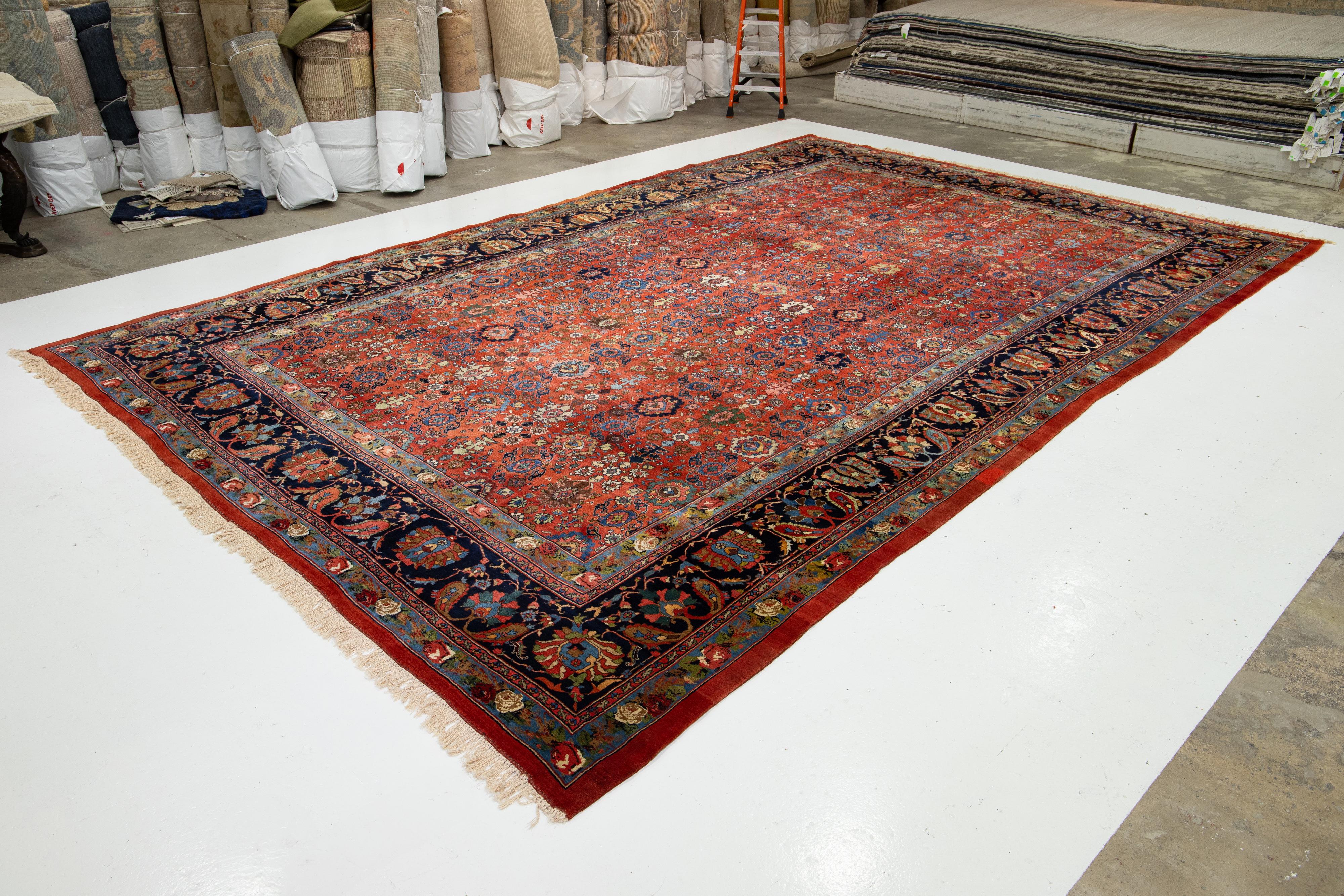 Islamique Tapis Bidjar rouge surdimensionné, fabriqué à la main, entièrement recouvert de laine, des années 1900 en vente