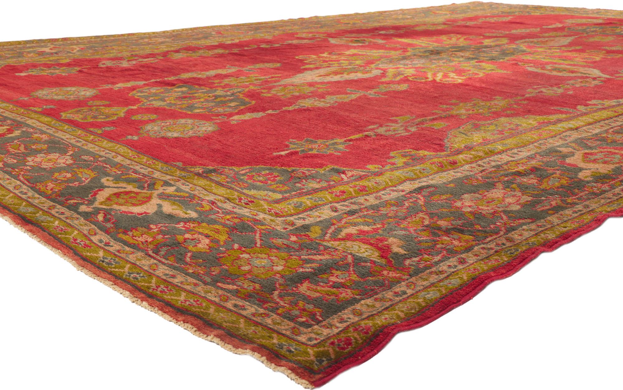 53766 large oversized red antique Persian Sultanabad rug with Jacobean Style 11'04 x 16'11. With its striking appeal and saturated red color palette, this hand-knotted wool antique Persian Sultanabad rug appears like a sumptuous Italian velvet,