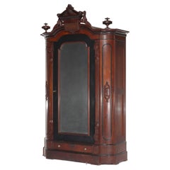 Armoire oversize rinascimentale in mogano ebanizzato parziale con medaglioni