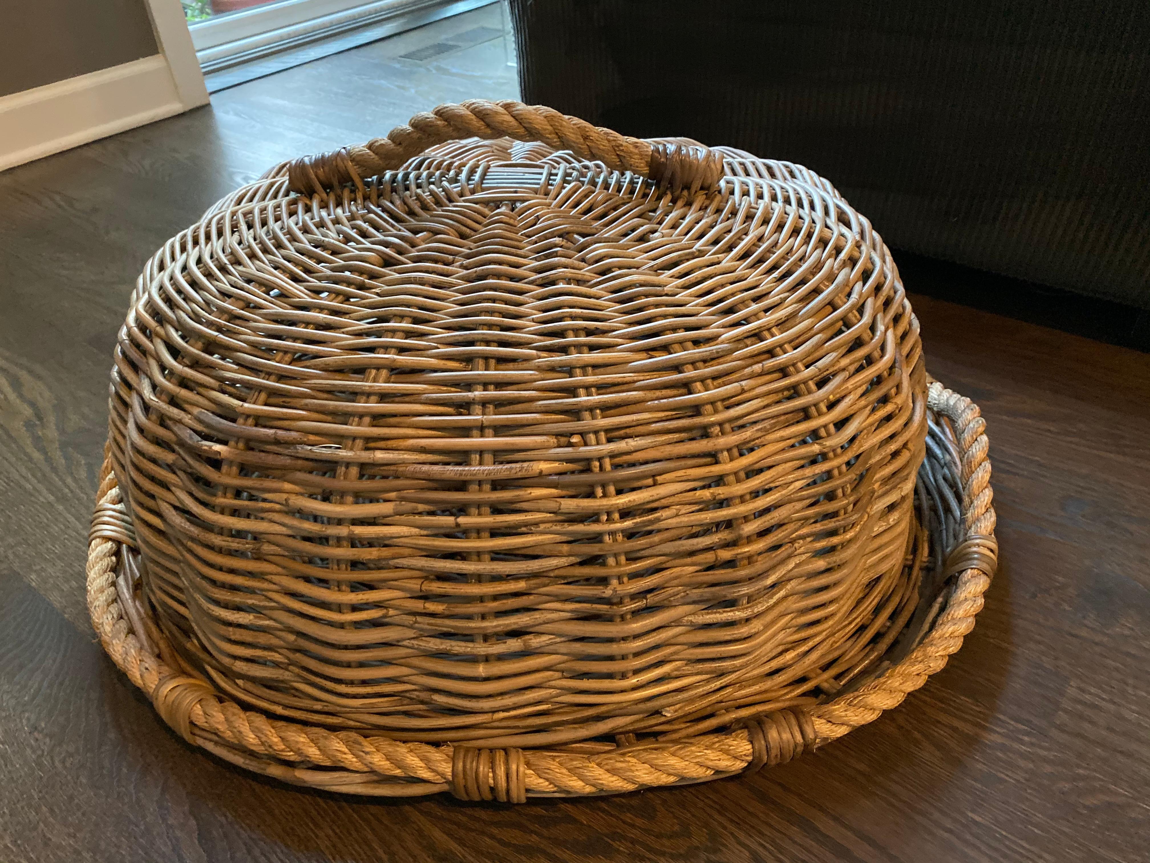 Incredible in the garden, on your buffet, as a centerpiece on your holiday table
oversized restoration hardware handmade rattan tray and cloche
never used.