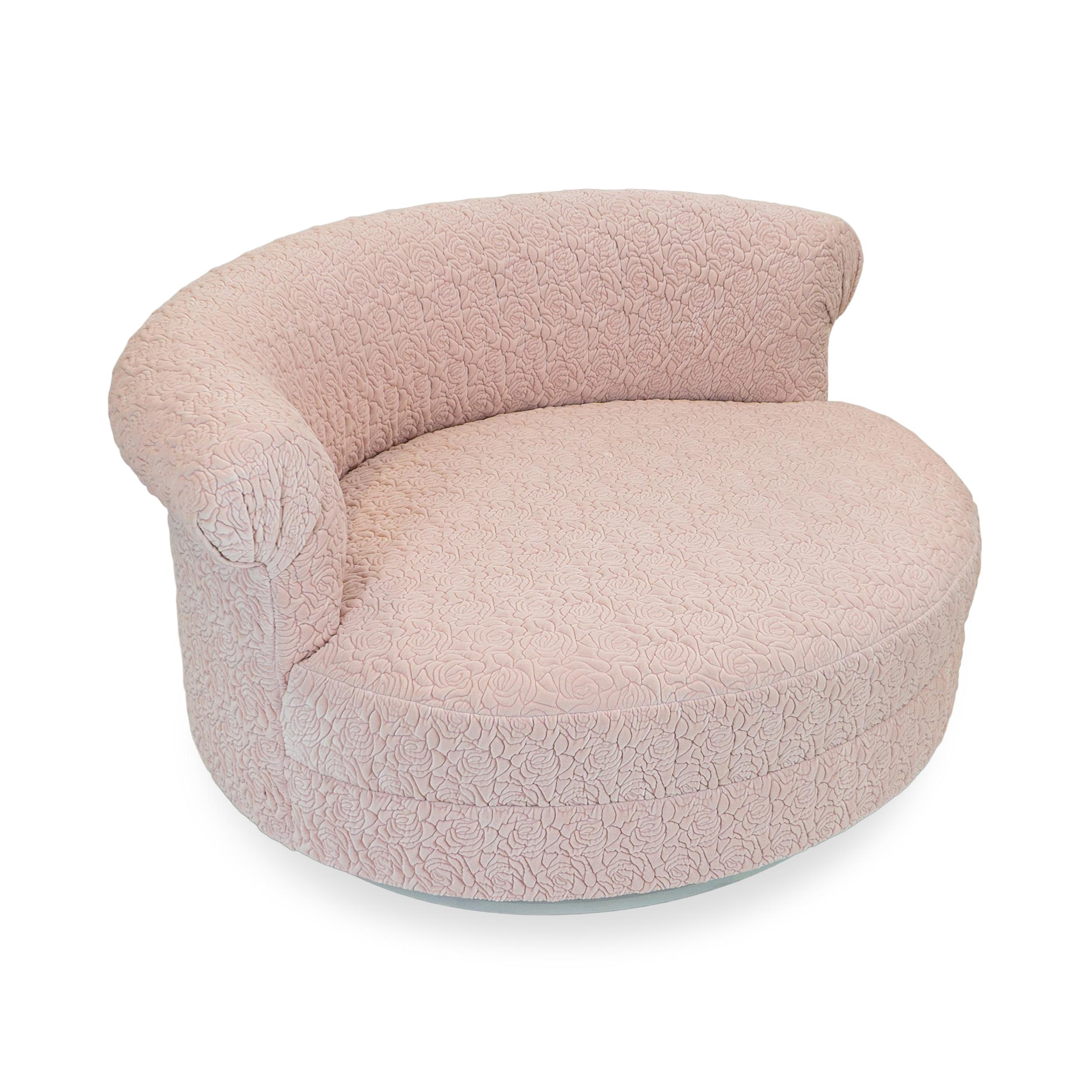 Customizable, just ask.
Oversized round lounge / club chair with recessed based and roll arm back. Upholstered with eight-way hand-tied springs and high density foam. Features performance quilted rose fabric in light pink which comes in other
