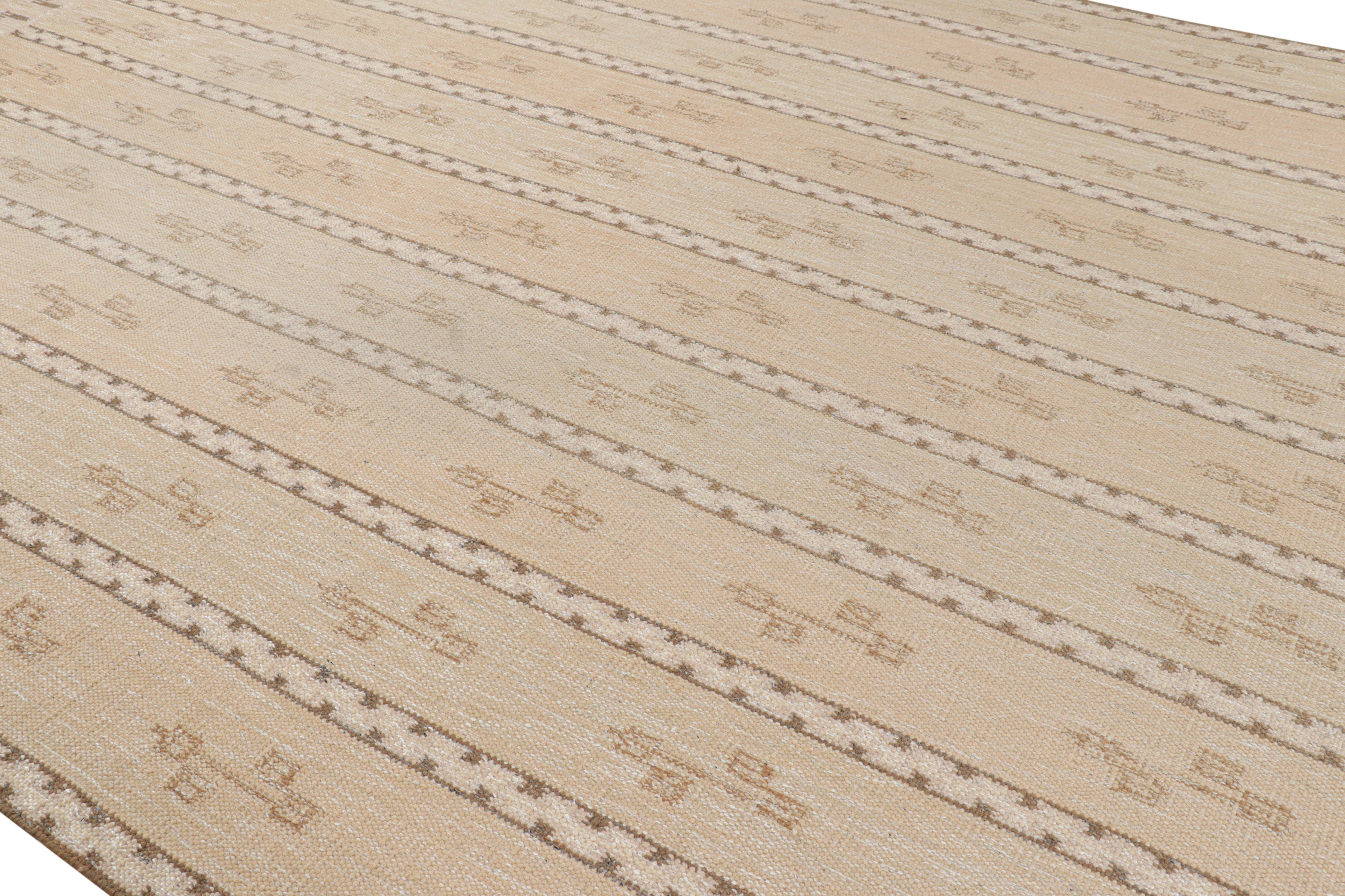 This 10x14 rug is a contemporary flatweave from the award-winning Scandinavian rug collection by Rug & Kilim. Hand woven in wool, its design reimagines the Swedish minimalist and deco sensibilities of Rollakan, Rya, and other mid-century textiles of