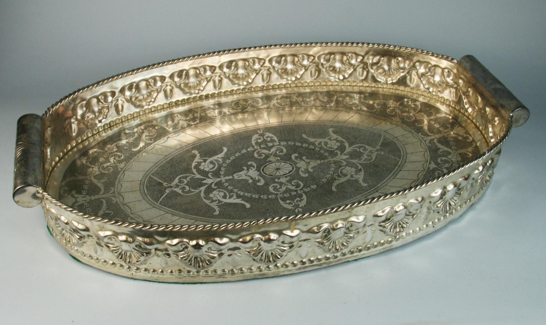 3-620 English  silvered brass  high bordered gallery barware or serving tray with intricate detailing with round handles.