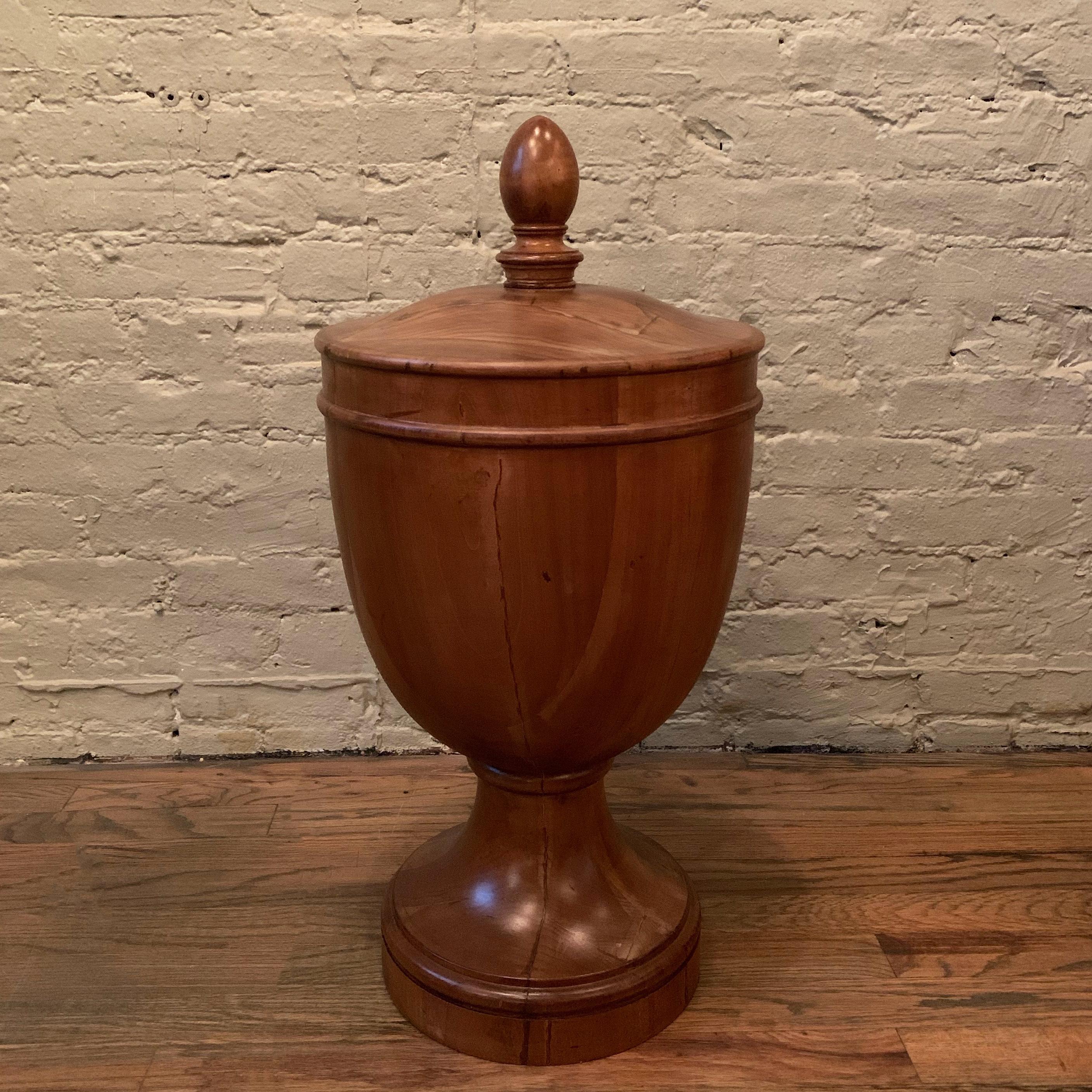 Impressively large, craftsman-made, solid mahogany, finial-shaped ornament or architectural object features a wonderful wood grain throughout.