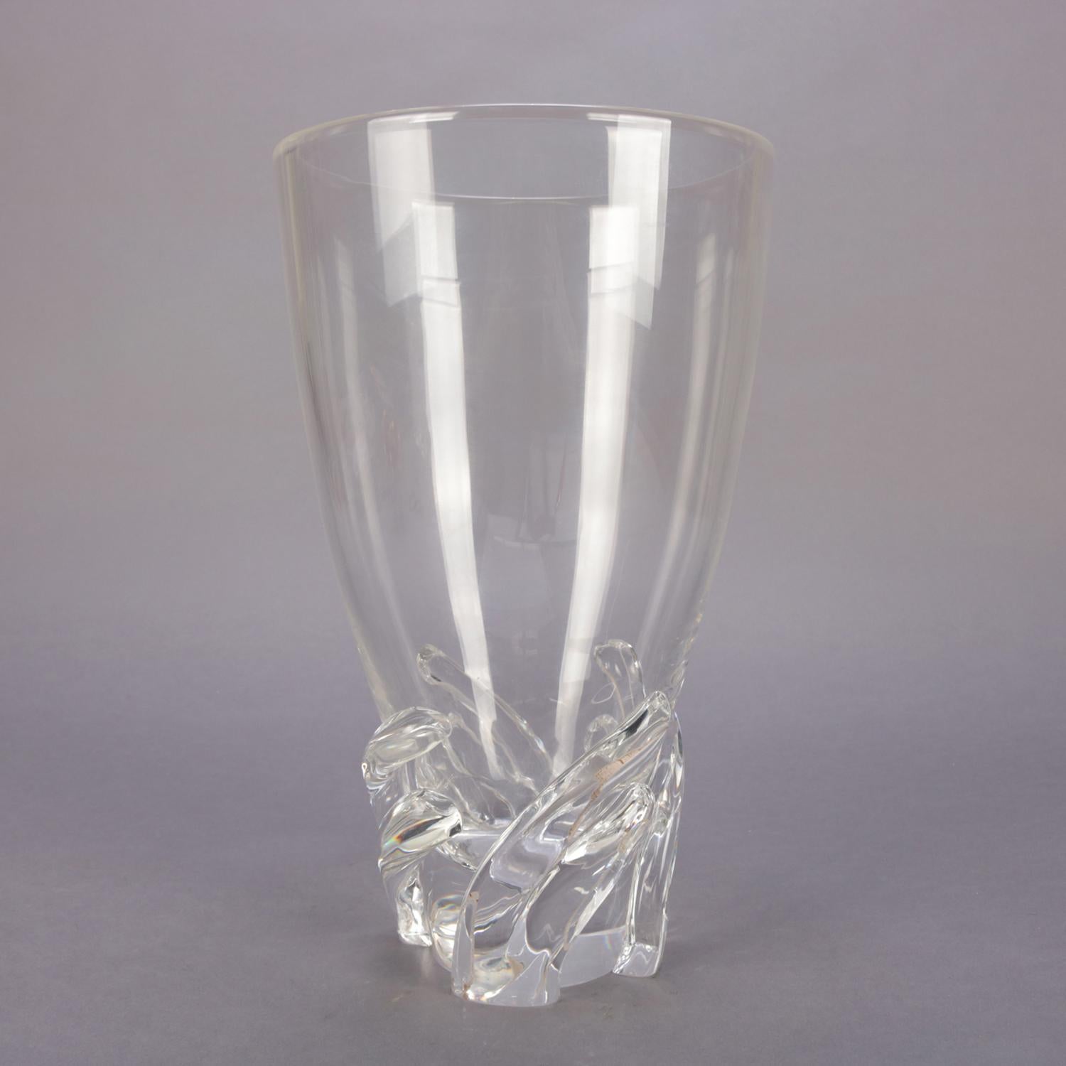 A large Steuben art glass Phoenix crystal vase features tapered conical form over swirled base, signed on base, 20th century

Measures: 13.75