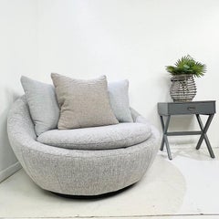 Oversized Swivel Satellite Chair in the style of Milo Baughman