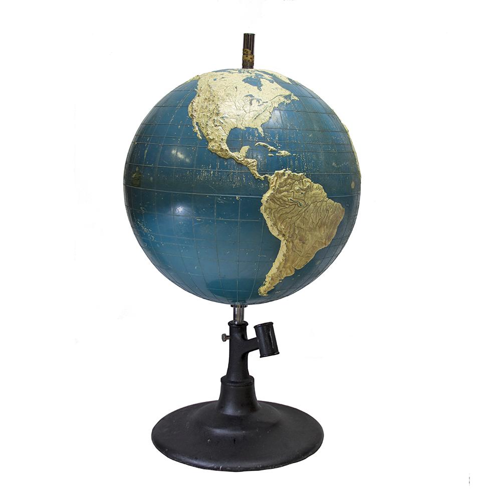 Constructed by the American Printing House for The Blind, this molded and painted fiberglass globe has topographical detailing for tactile engagement. Made in the 1950s, the globe is large and would make an excellent decor object.