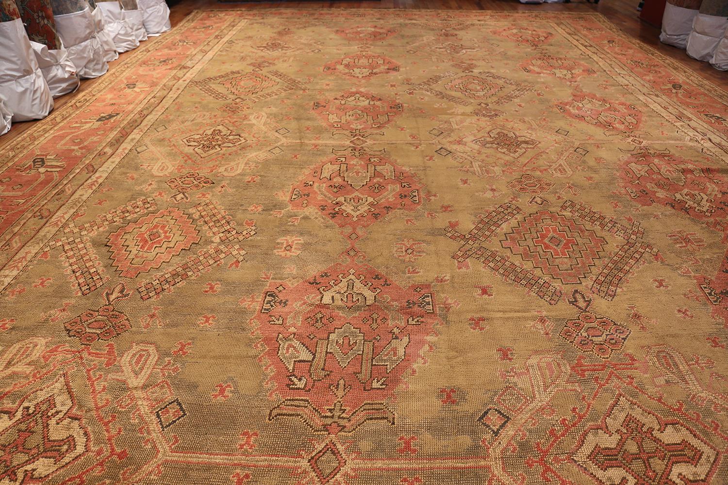 Tribal Oversized Antique Turkish Oushak Rug, Country of Origin: Turkey, Circa Date: 1900 — Size: 16 ft 3 in x 24 ft 7 in (4.95 m x 7.49 m).