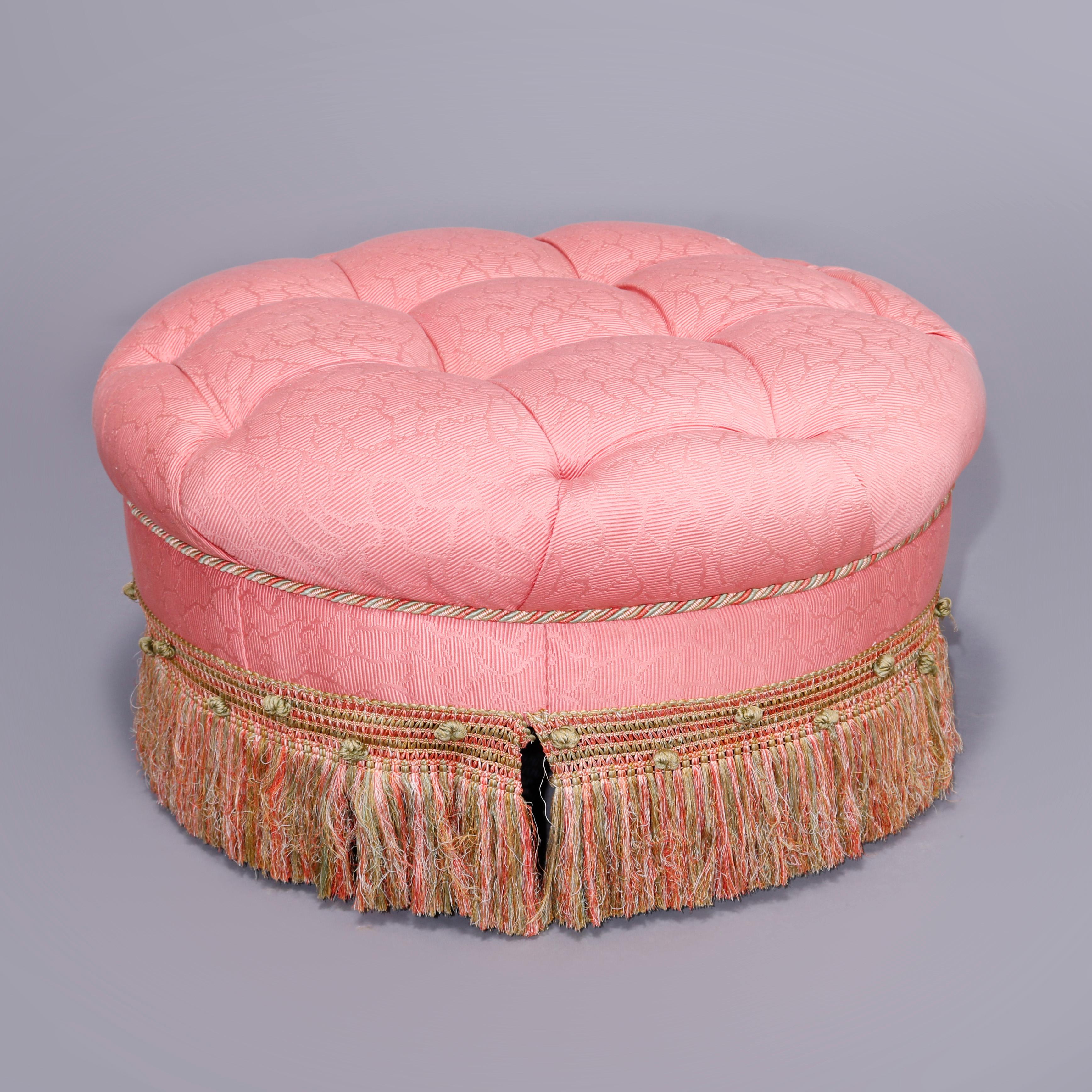 A large overstuffed ottoman offers round form with tufted seat and fringed skirt, 20th century.

Measures - 18''height x 33''diameter.
 