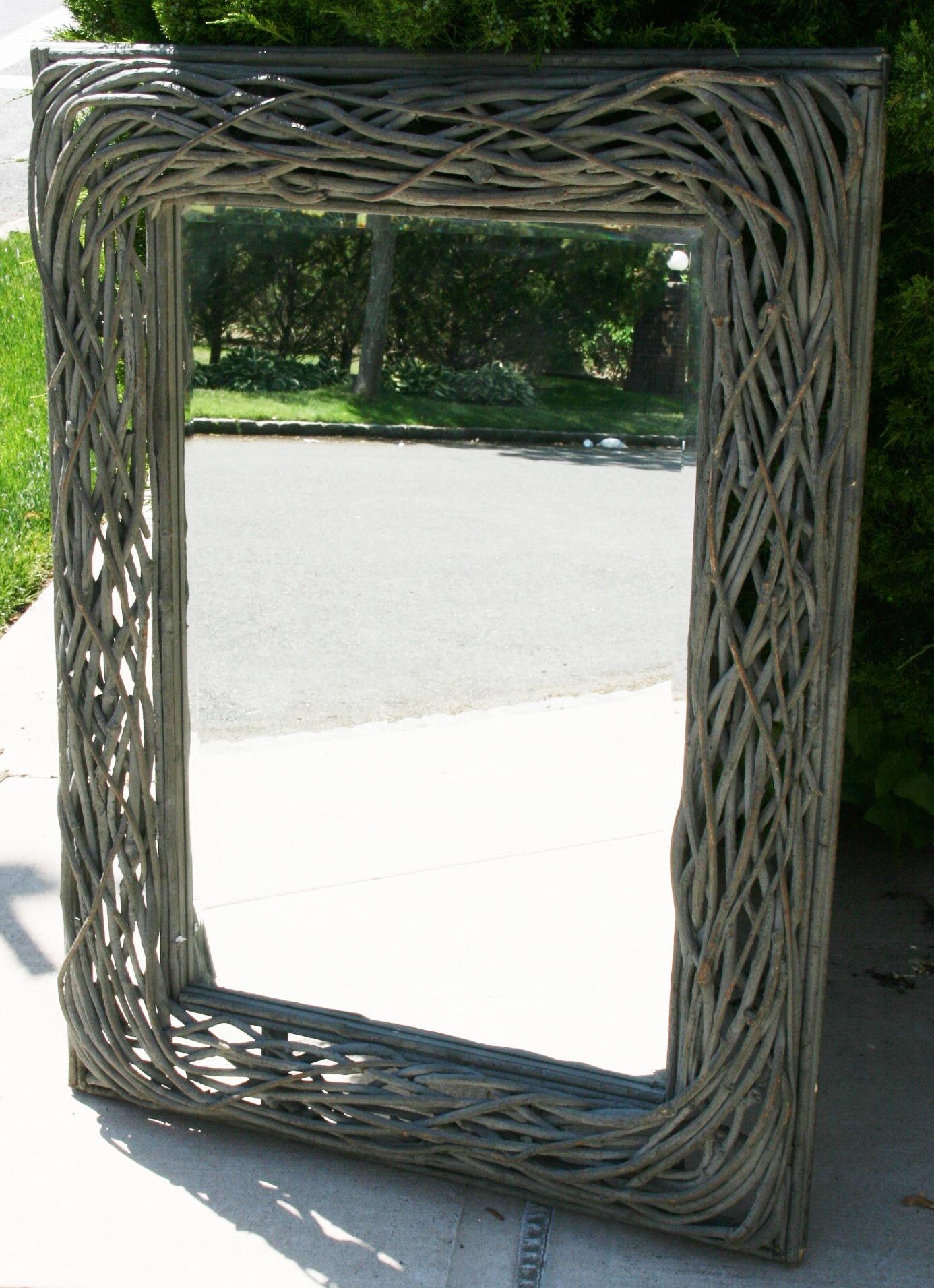 3-572 Hand crafted twig mirror with beveled glass mirror.