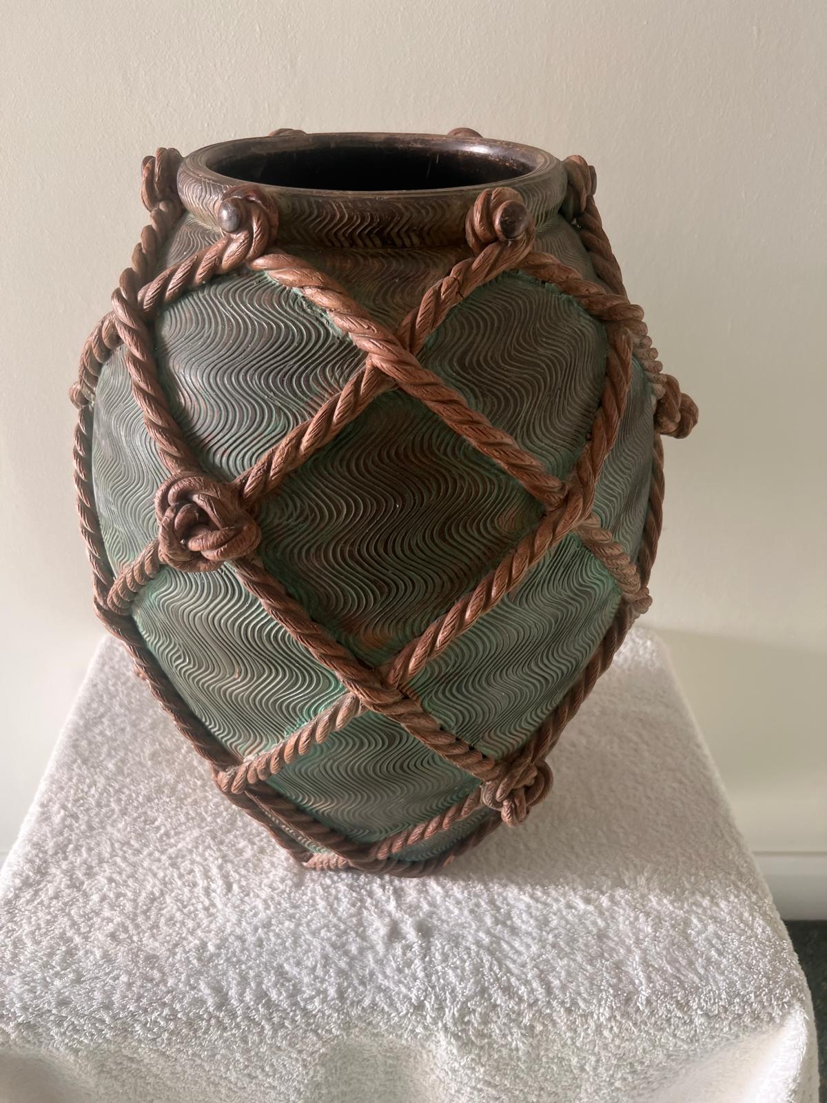 Large oversized vase in terracotta, with rope design and all over green wash, signed to base Ugo Zaccagnini. Italy 1950s.