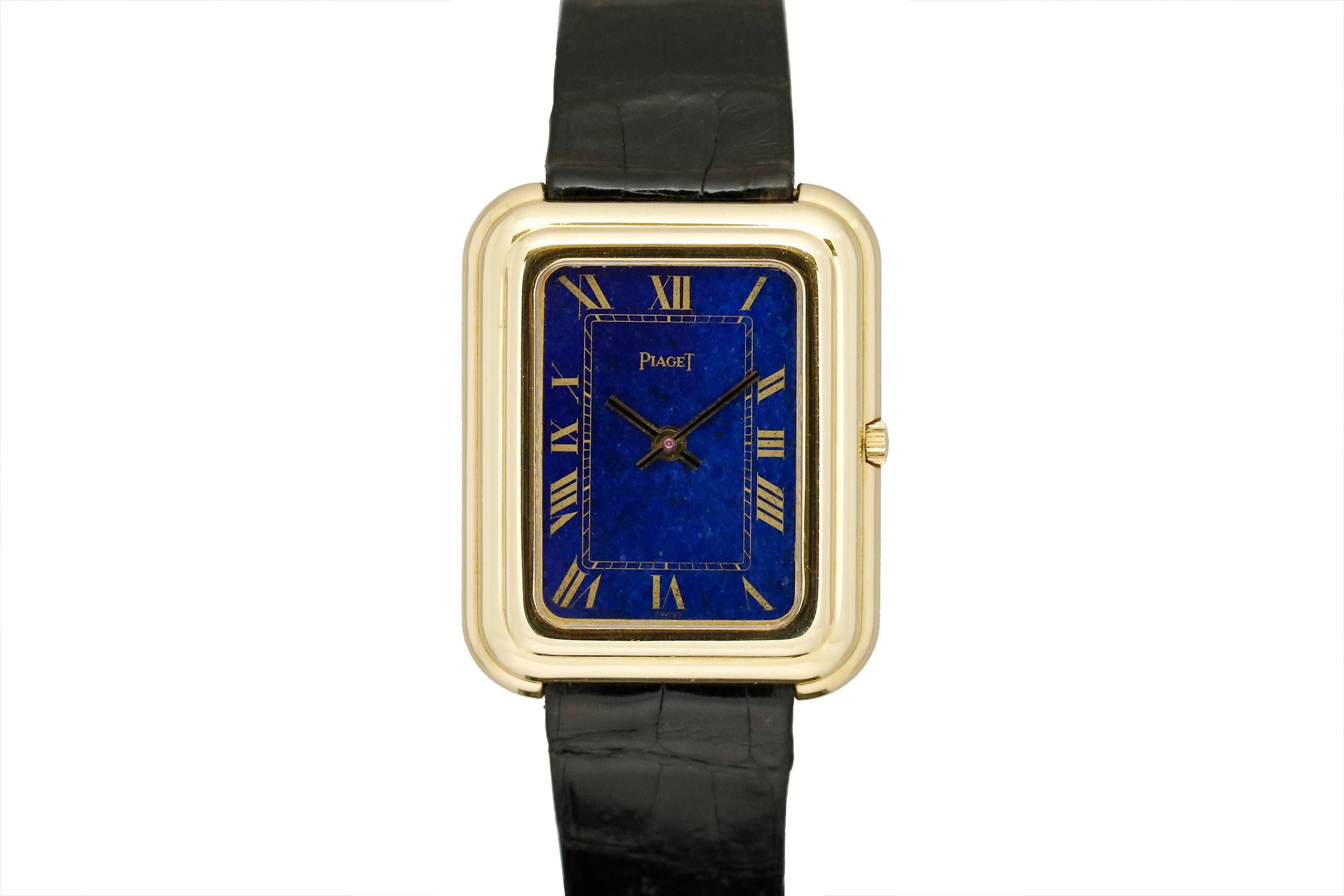 Oversized 18k yellow gold Piaget with lapis lazuli dial, Beta-21 quartz movement on a Piaget strap and buckle.