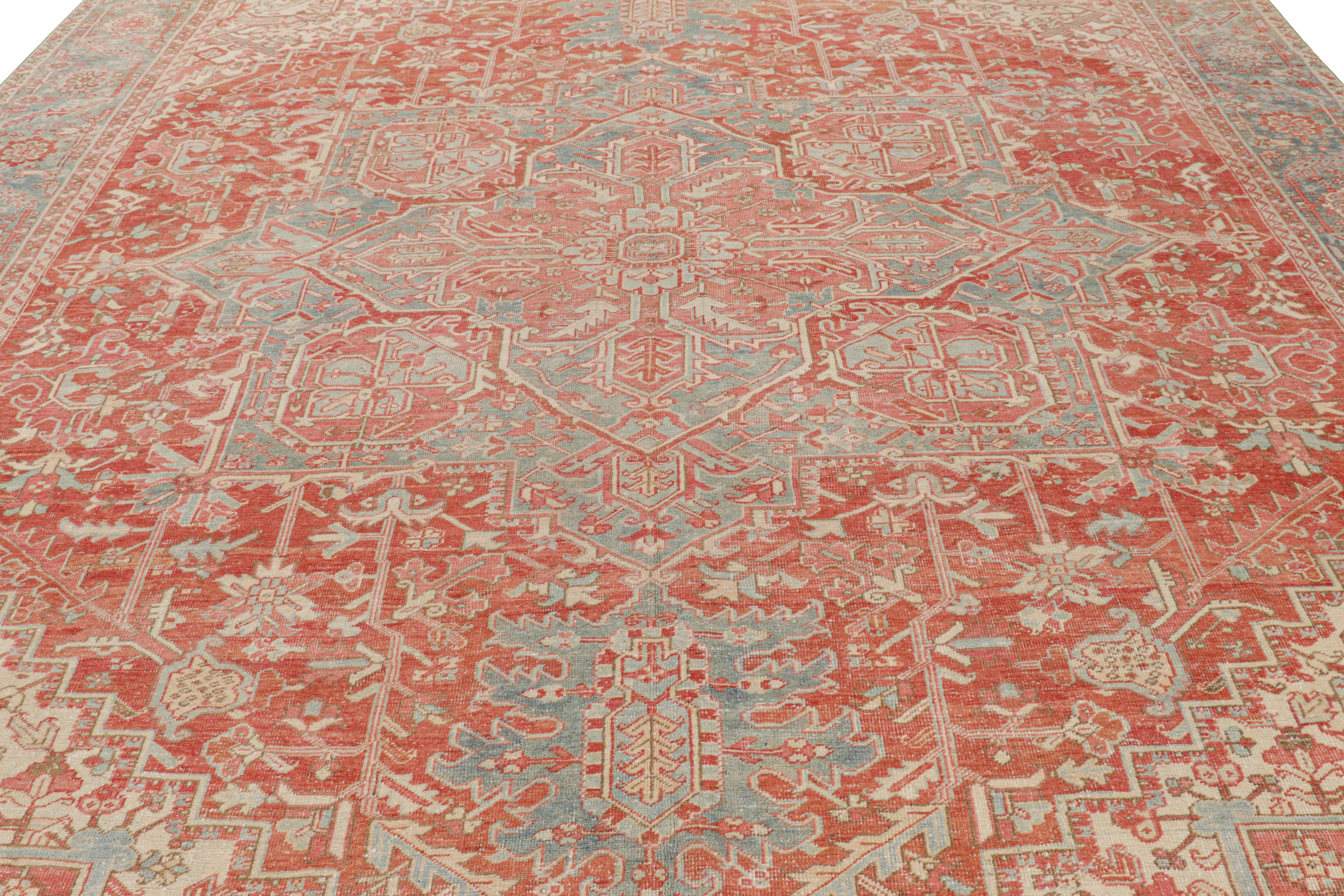Hand-knotted in wool and originating from Turkey, circa 1950-1960, this 11x14 design is clearly inspired by Persian Heriz and Serapi rugs, known to enjoy both these colors and the marriage of such an elaborate all over pattern with a large central