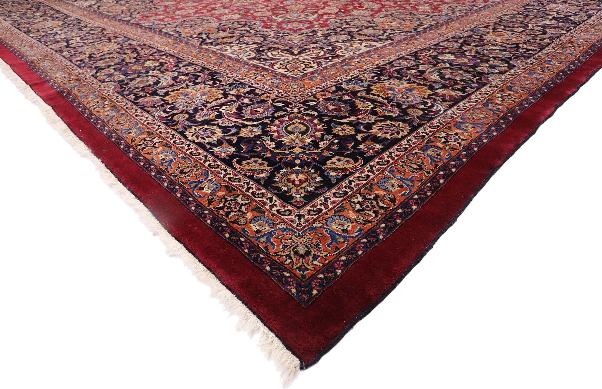 77405 Vintage Persian Mashhad Rug with Victorian Style 16'09 x 22'02.
Rich in color, texture and beguiling ambiance, this hand-knotted wool vintage Persian Mashhad palace rug beautifully displays timeless elegance and regal charm. A stunning