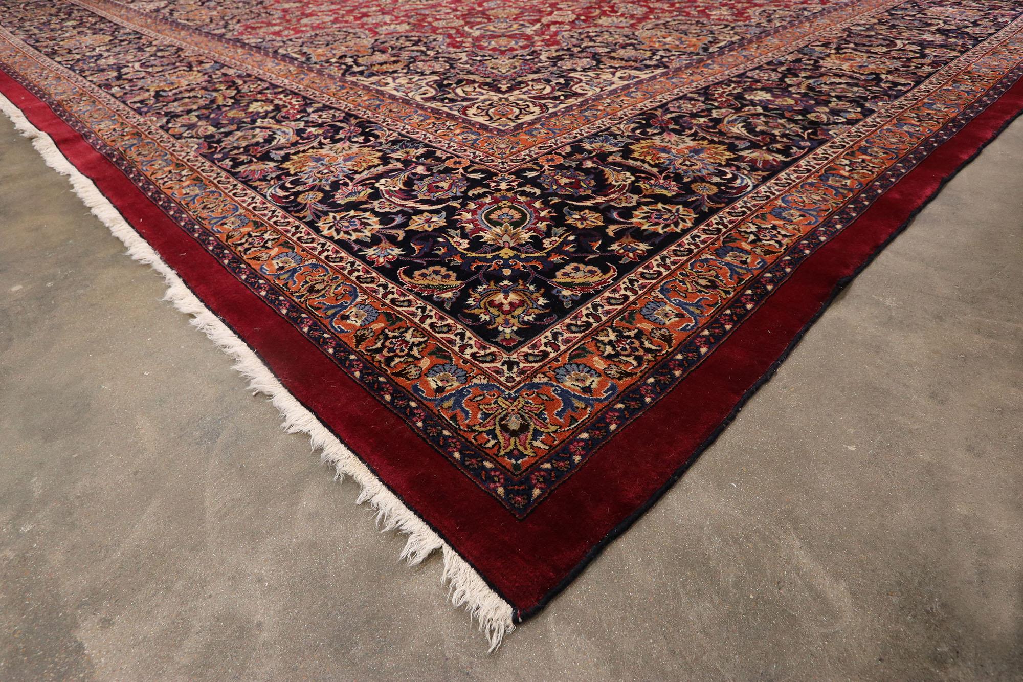 20th Century Oversized Vintage Persian Mashhad Rug, Regal Charm Meets Beguiling Beauty For Sale