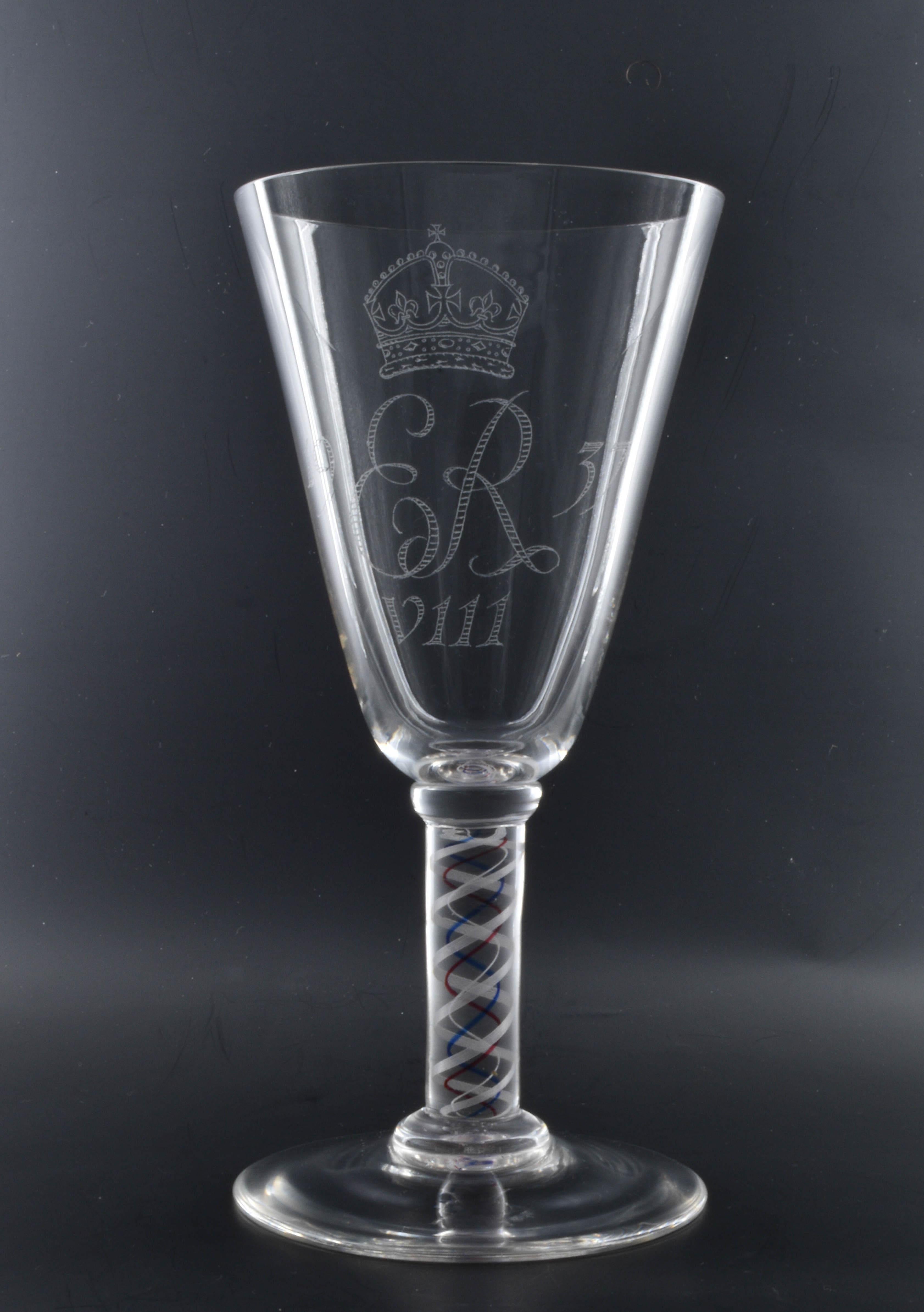 Lead crystal wine glass, with airtwist & coloured thread stem. Made for the coronation of Edward VIII; a coronation that did not happen.


Edward VIII, born Edward Albert Christian George Andrew Patrick David on June 23, 1894, was the eldest son of