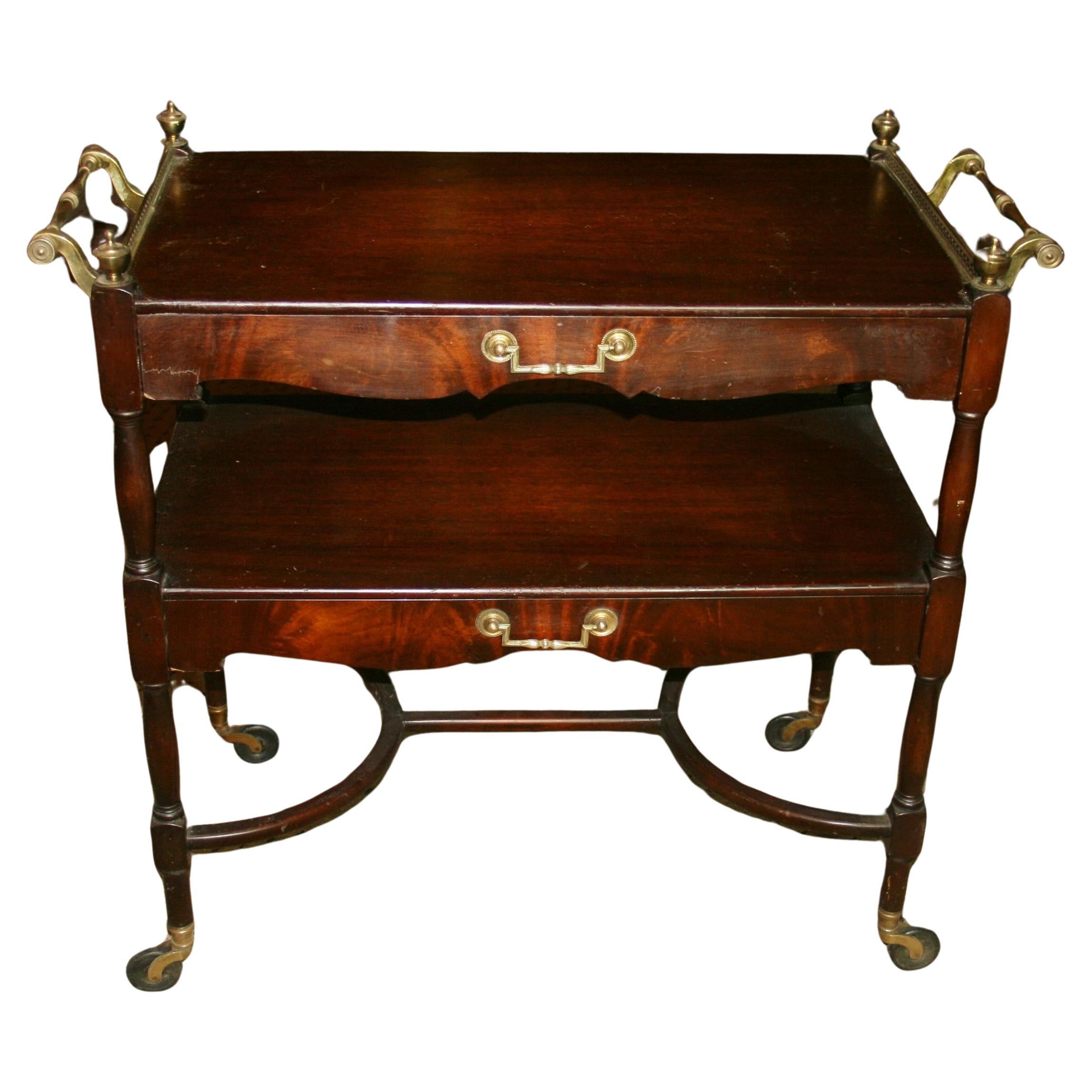 1533 Oversized English style wood and brass serving cart
Has 2 pull drawers
Top surface dimensions 17.5x31