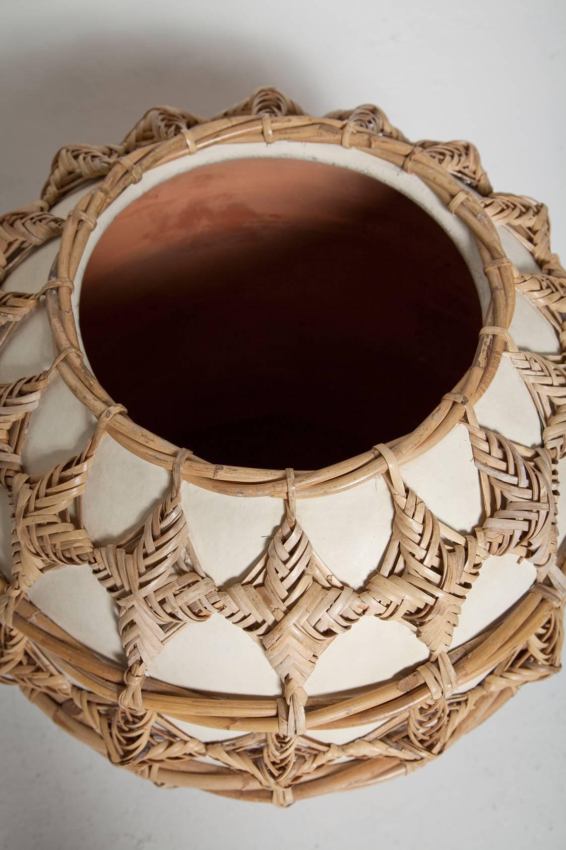 rattan wrapped vase