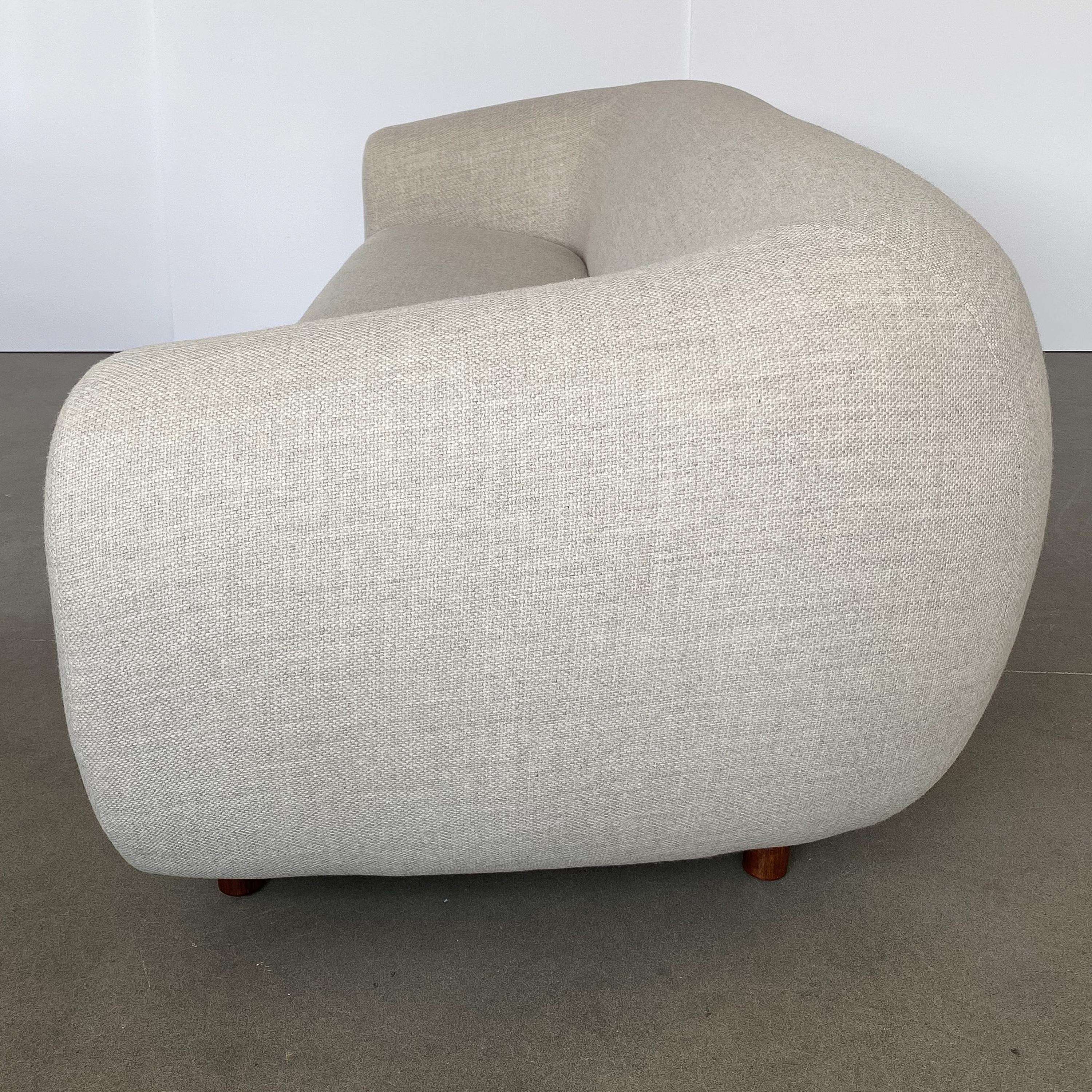 Stained Overstuffed Polar Bear Style Sofa