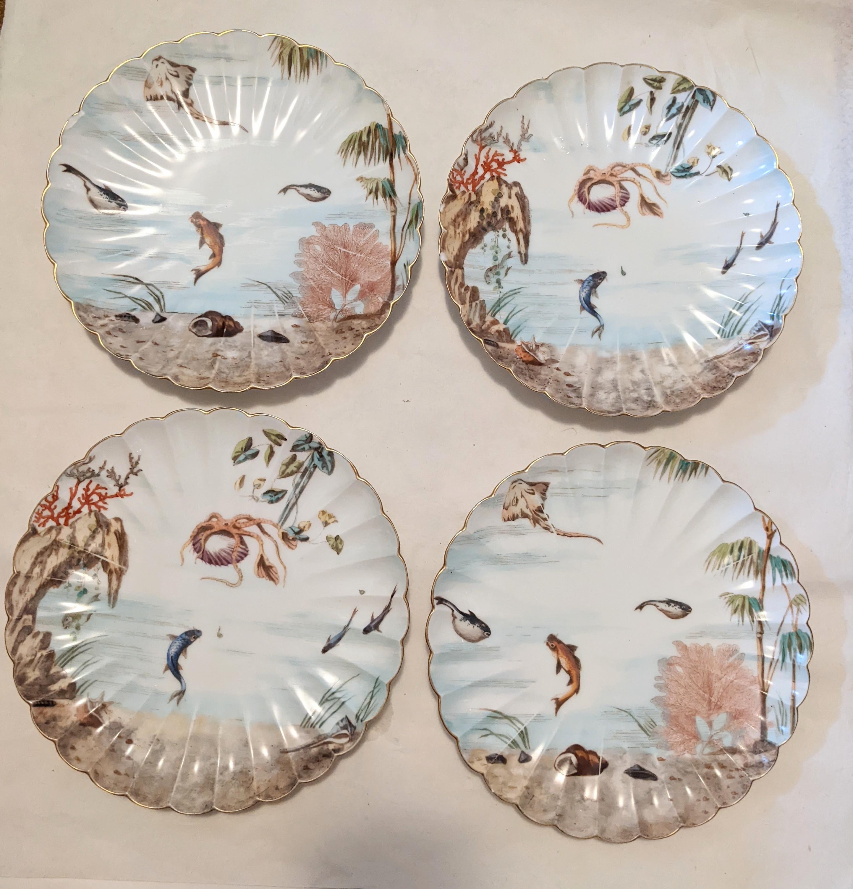 Attractive set of fish plates retailed by Ovington from the 1930's, for use only as display as several have chipped edges. 4 out of 6 have chipping but not severe, great for display purposes. Very charming depictions of marine life. 
8.5