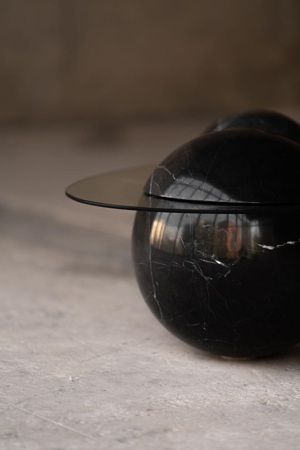 The Ovni Uovo Sculptural Coffee Table presents a retro-futurist fantasy. Performing as a past vision of the future Ovni Uovo constructs over mysterious tales of speculative technologies and flying sauers; its sleek and elegant shapes melancholically