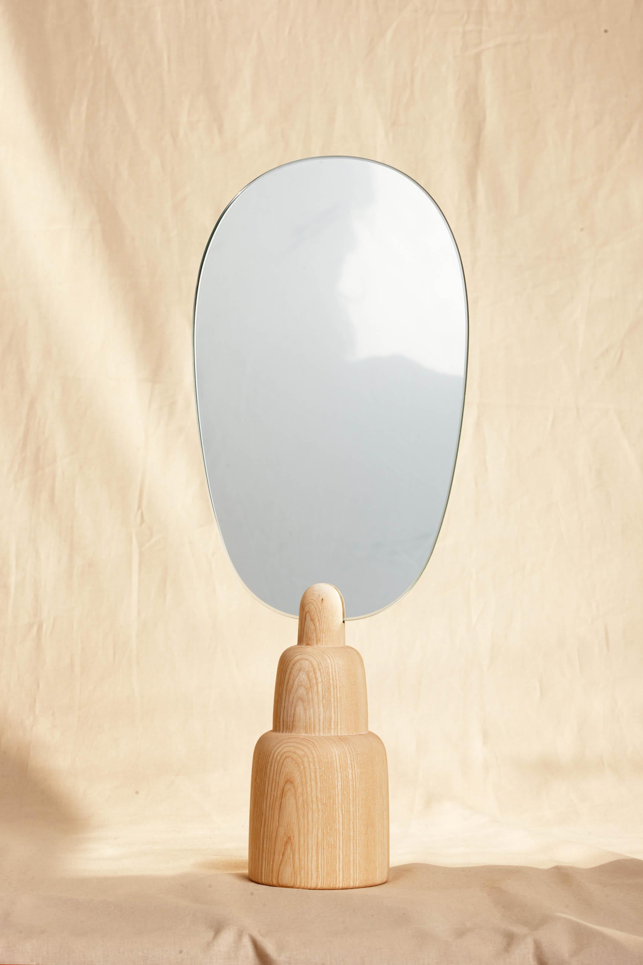 Ovoid Mirror by Ebba Lindgren
Dimensions: D 14 x W 21 x H 67 cm.
Materials: Ash wood with hard-wax oil, mirror.


Ebba Lindgren
Is an internationally renowned artist/designer based in Malmö. Lindgren's practice is artistic and concept-driven. By