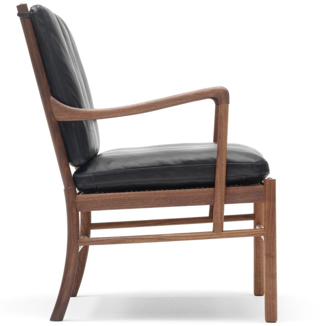 'OW149 Colonial ' chair in oak, black leather and oil for Carl Hansen & Son

The story of Danish Modern begins in 1908 when Carl Hansen opened his first workshop. His firm commitment to beauty, comfort, refinement, and craftsmanship is evident in