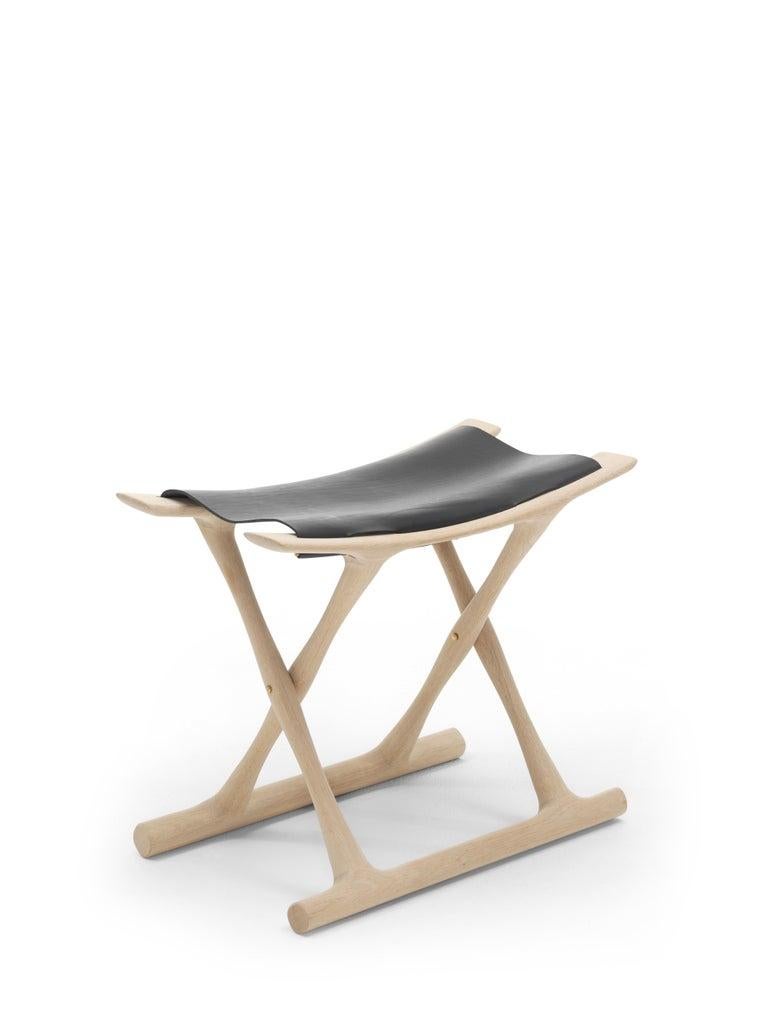 The OW2000 Egyptian stool was designed by Ole Wanscher in 1957. The influence of his travel outside of Denmark is clear to see in this intriguing design. While in Egypt, Wanscher became fascinated with old seats of power, leading to the design of