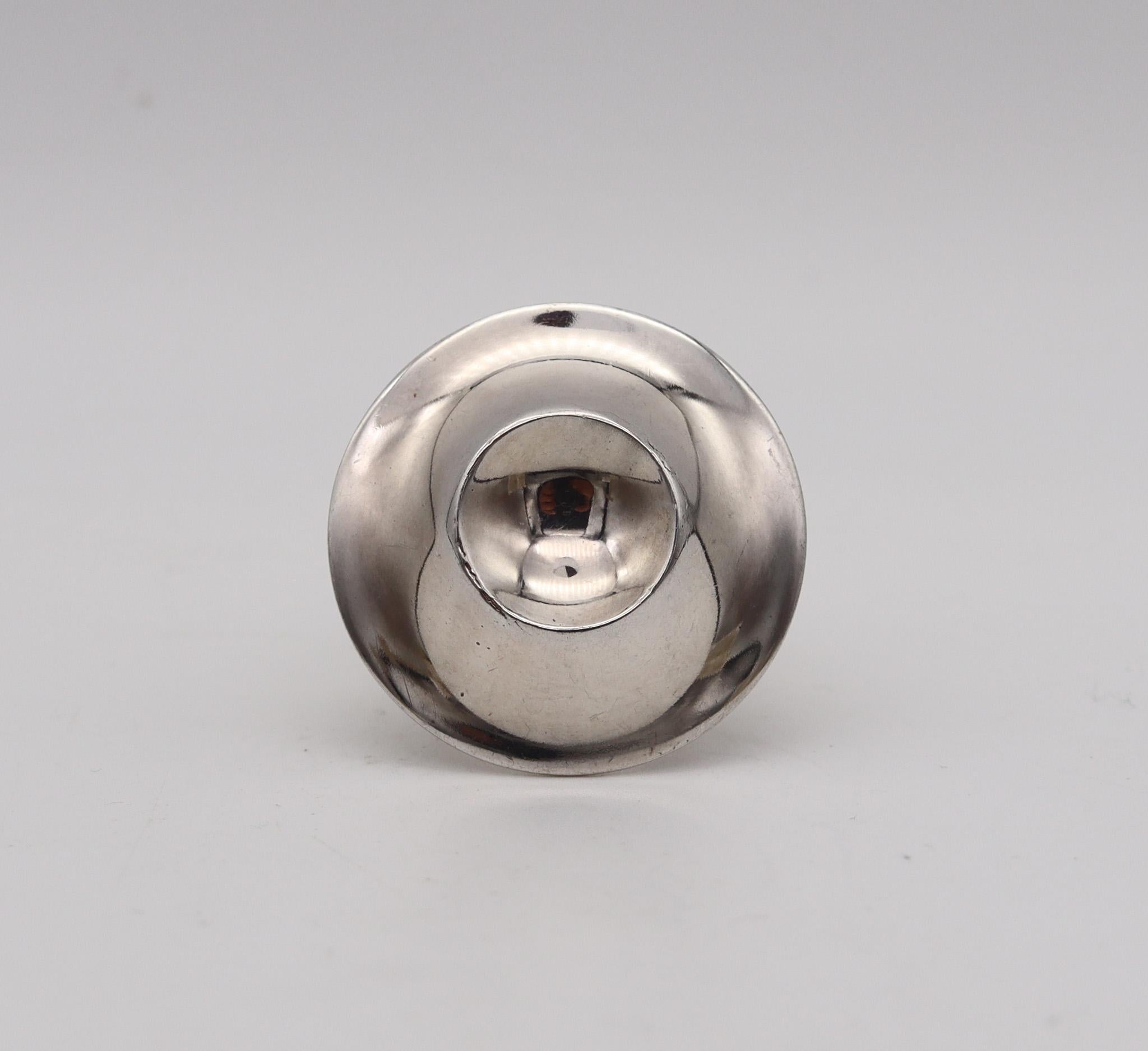 Modernist ring designed by Owe Johansson.

Fabulous modernist ring, created in Finland by the artist silversmith Owe Johansson, back in the 1970. This ring has been crafted as a large dome with an incuse circle in solid .925/.999 sterling. with high