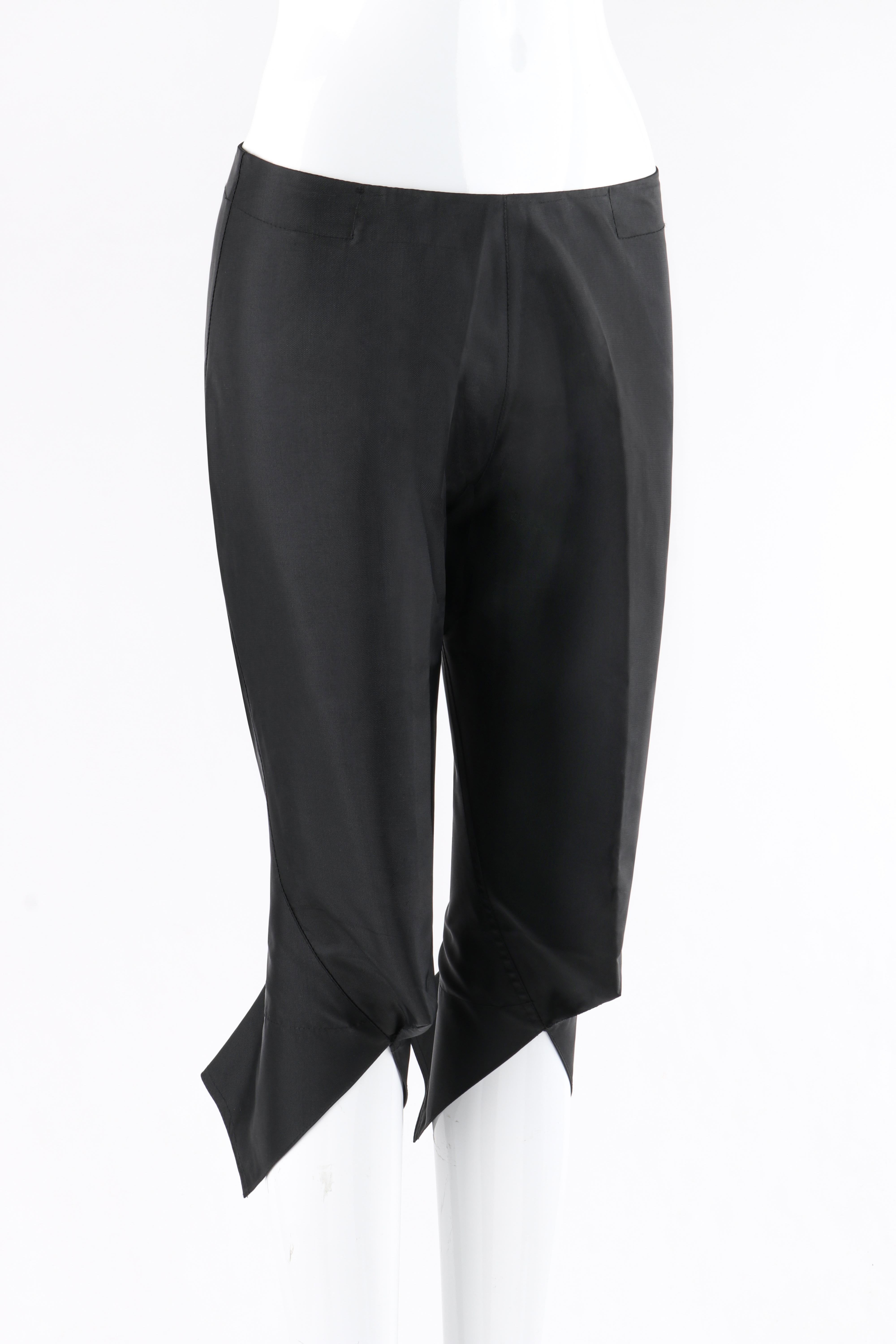 OWEN GASTER c.1996 “Grasshopper” Black Cropped Structured Knicker Trouser Pants

Brand / Manufacturer: Owen Gaster
Circa: 1996
Designer: Owen Gaster
Style: Tailored capri pants
Color(s): Black
Lined: No
Unmarked Fabric Content (feel of): Nylon;