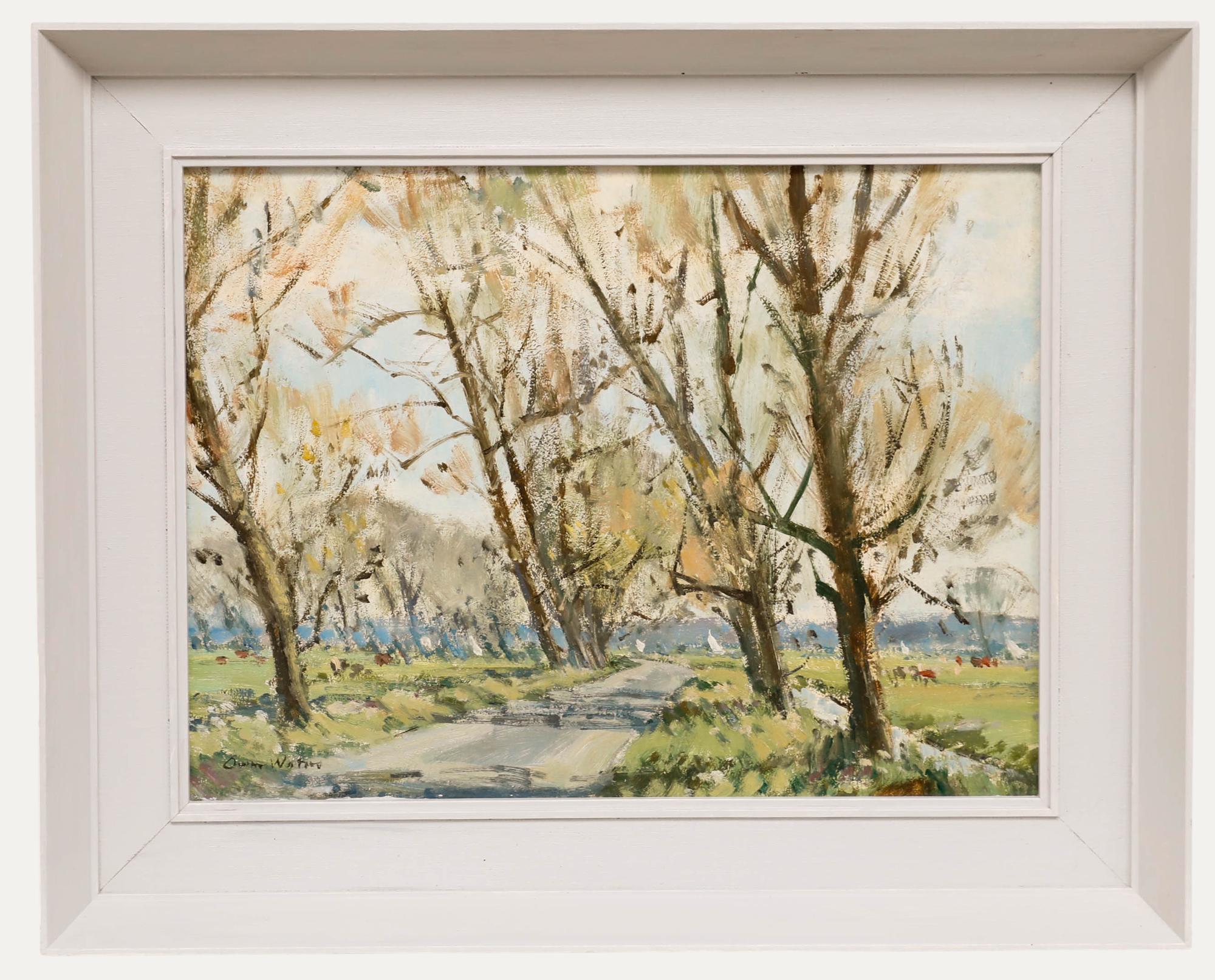 This pastoral landscape painting depicts a serene countryside path winding through a grove of bare-branched trees leading through to a lake with yachts. The artist employs a soft, impressionistic palette of muted greys, gentle greens, and warm earth