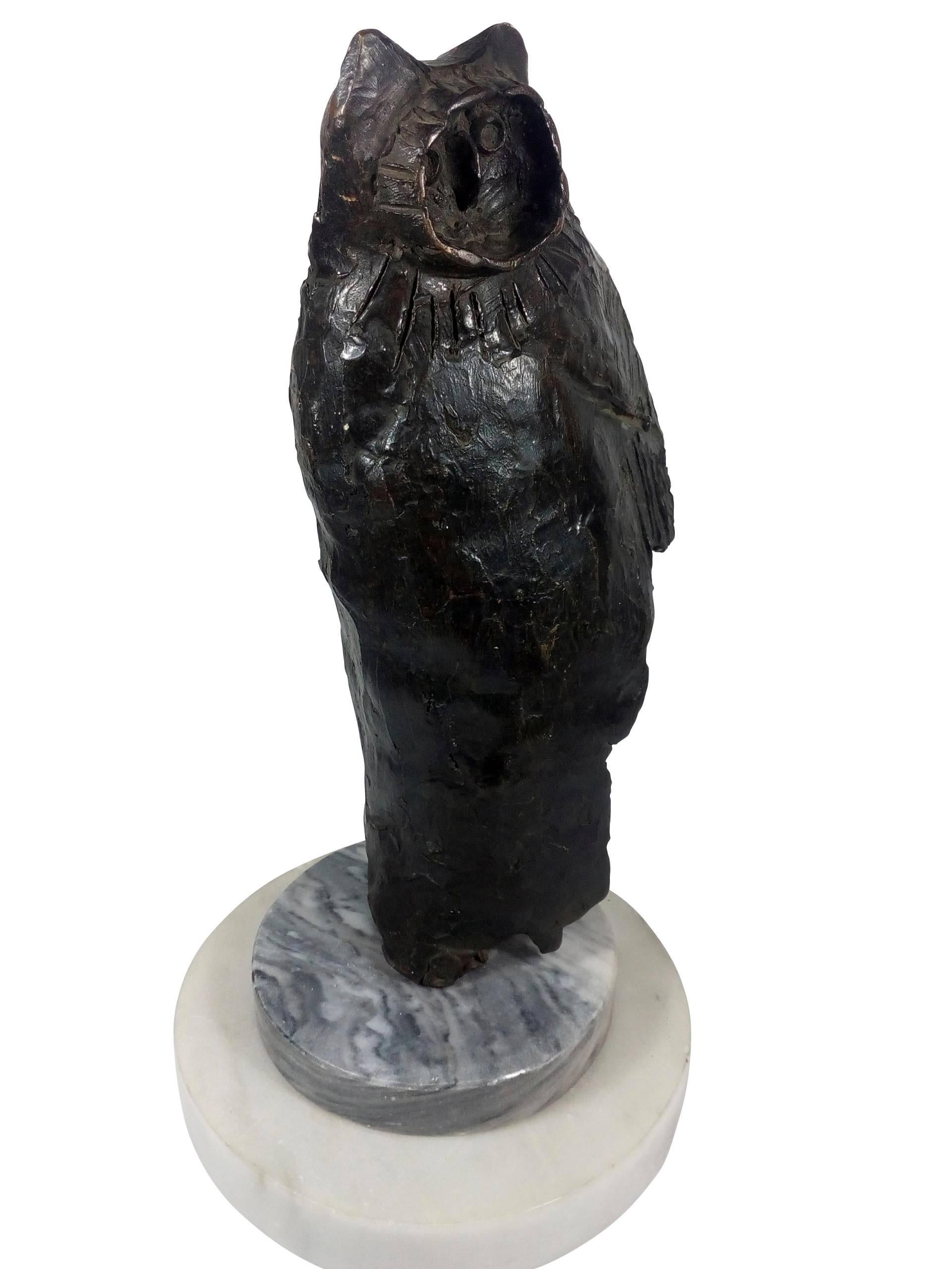 Owl in bronze with black patina, in the brutalist style, made and signed by the prolific Mexican artist Heriberto Júarez 1932-2008. Júarez was a self taught artist that began making clay replicas of prehispanic figures found in his childhood town