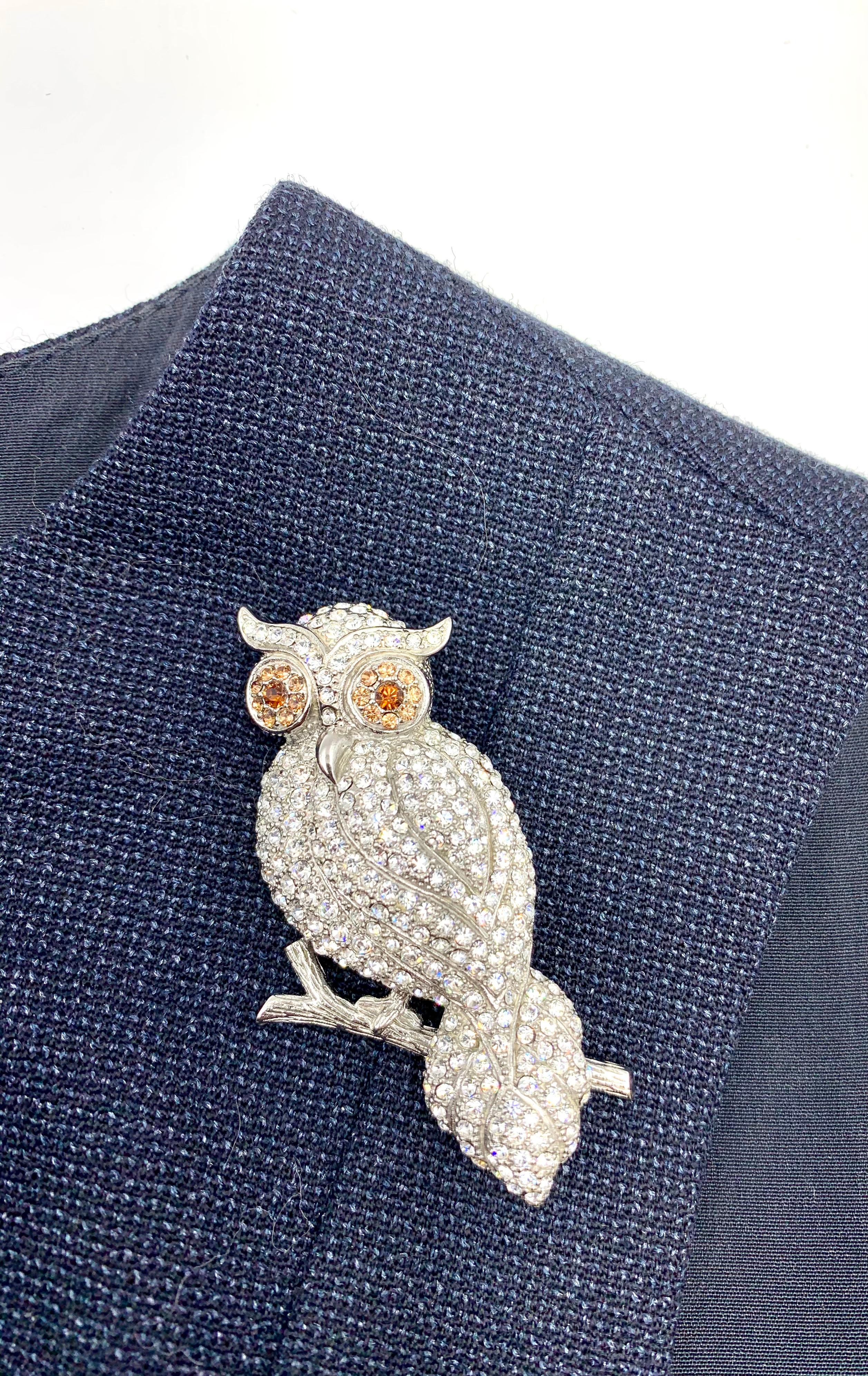 Beautiful vintage Brooks Brothers Golden Fleece sterling silver owl brooch set with a multitude of white crystals, the eyes in amber colored crystals. Superb attention to detail and quality, on par with a fine jewel. Brooks Brothers adopted the