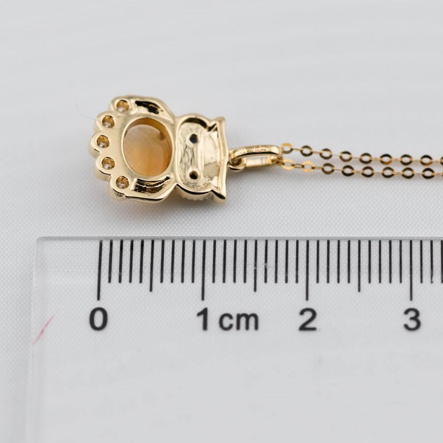 Collana con ciondolo in oro giallo 18 carati con opale di fuoco messicano e zaffiro e diamanti.


Spedizione nazionale gratuita USPS di prima classe! Borsa o scatola regalo in omaggio con ogni ordine!

L'opale, la regina delle gemme, è una delle